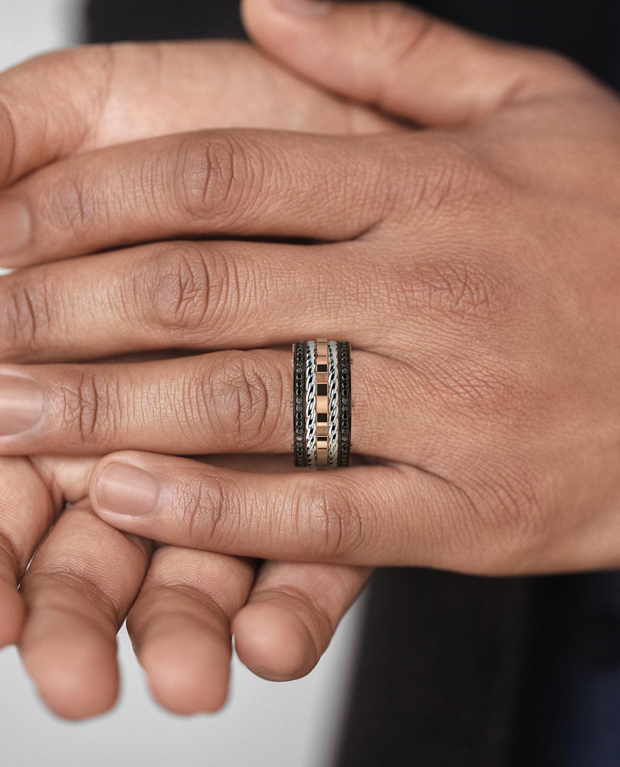 Three bold-looking two-tone rings, pave set with 1.05ct brilliant cut round black diamonds, connected by the signature exclusive Rockford screws with rope designs flowing in between the bands. Our ROPES ring has a very modern, striking look with a