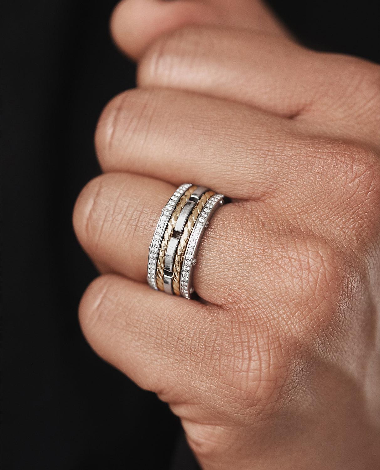 Three bold-looking two-tone rings, pave set with 1.05ct brilliant cut round white diamonds, connected by the signature exclusive Rockford screws with rope designs flowing in between the bands. Our ROPES ring has a very modern, striking look with a