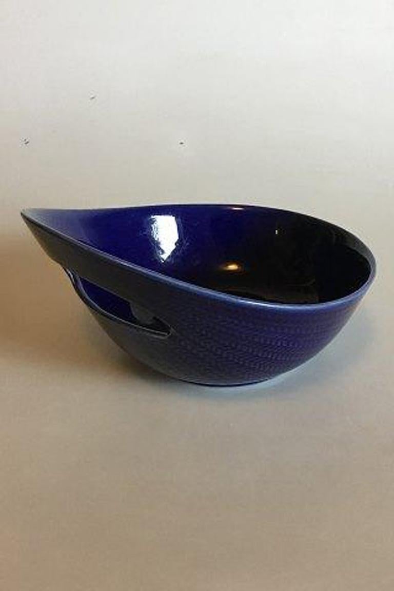 Rorstrand blå eld / blue fire serving bowl with handle. 

Blaa Eld / Blue Fire designed by Hertha Bengtsson manufactured by Rorstrand from 1950 to 1971. It has a great retro shape and decorated with a brilliant herringbone in a gorgeous blue high