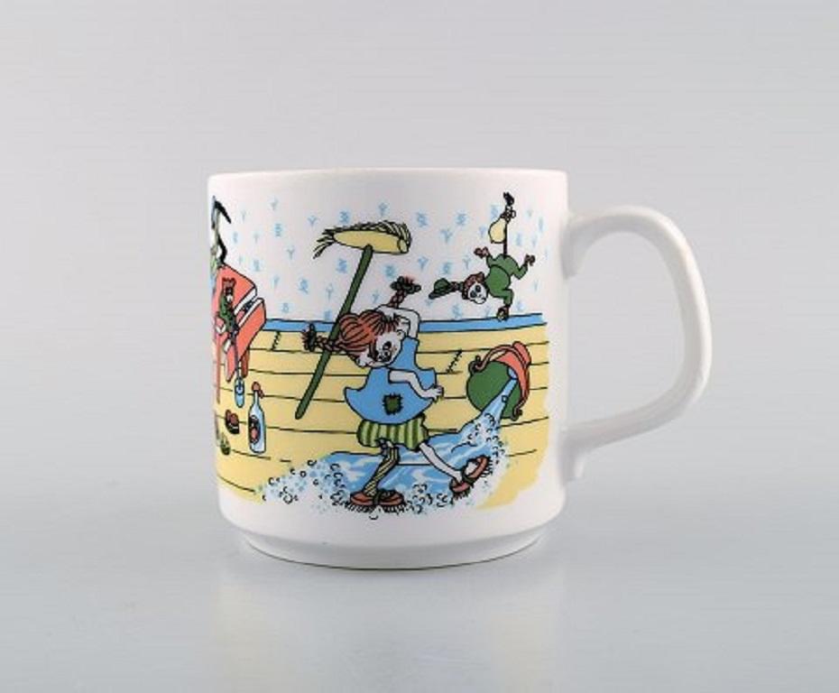 Scandinavian Modern Rörstrand, Four Cups and a Plate in Porcelain with Pippi Longstocking Motifs