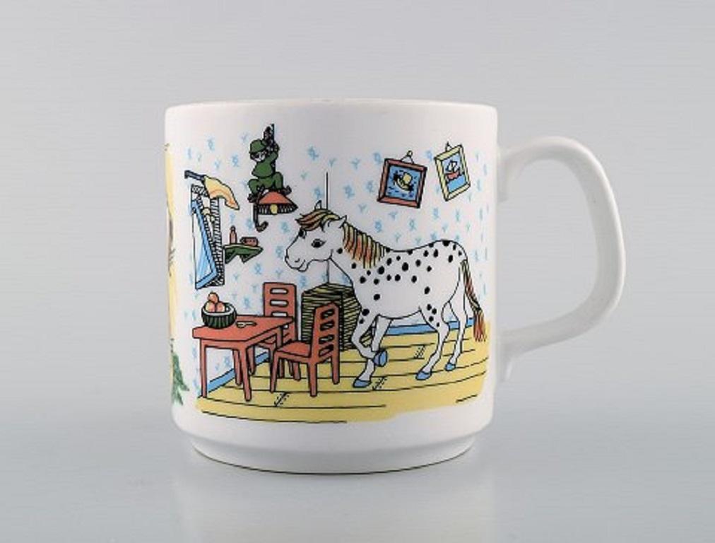 Swedish Rörstrand, Four Cups and a Plate in Porcelain with Pippi Longstocking Motifs