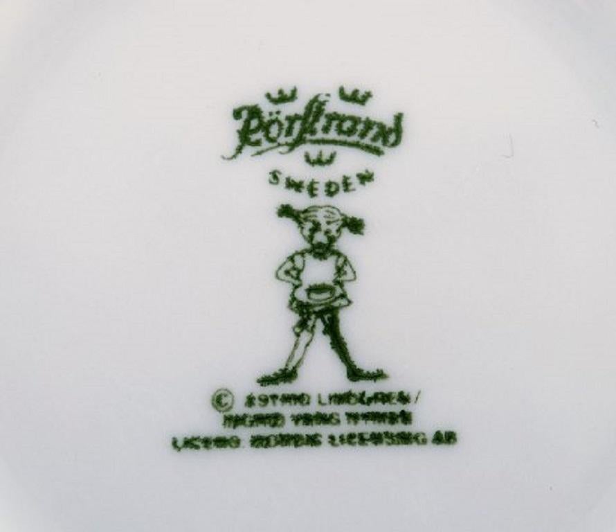 20th Century Rörstrand, Four Cups and a Plate in Porcelain with Pippi Longstocking Motifs