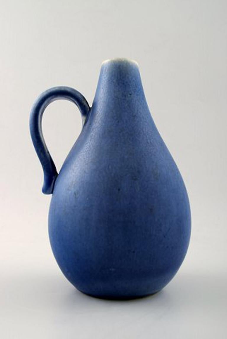 Rörstrand pitcher in ceramics.
Beautiful glaze in shades of blue.
In perfect condition.
Measures: 16 cm. X 11 cm.
Stamped. L 23.