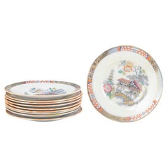 Rörstrand. Ensemble de dix assiettes plates en faïence. Série "Japon". Début du 20e siècle.