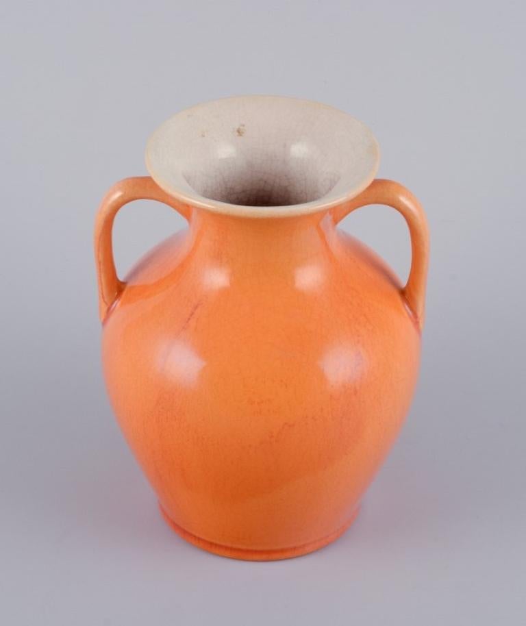 Swedish Rörstrand, Sweden, earthenware vase with handles in uranium yellow glaze. For Sale