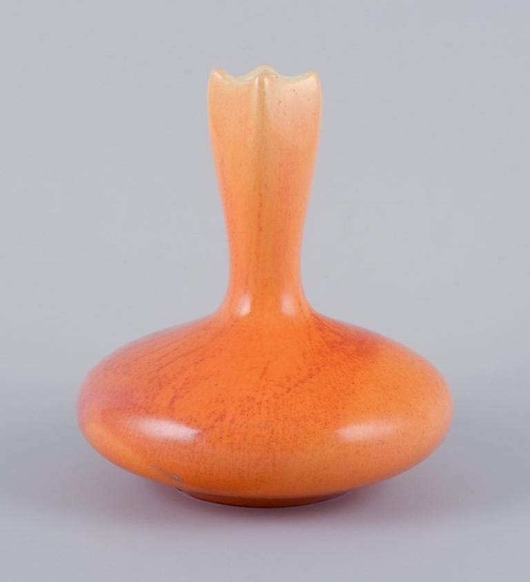 Rörstrand, Sweden, faience vase with uranium yellow glaze.
Early 20th century.
Marked.
In excellent condition.
Dimensions: H 15.5 cm x D 13.2 cm.