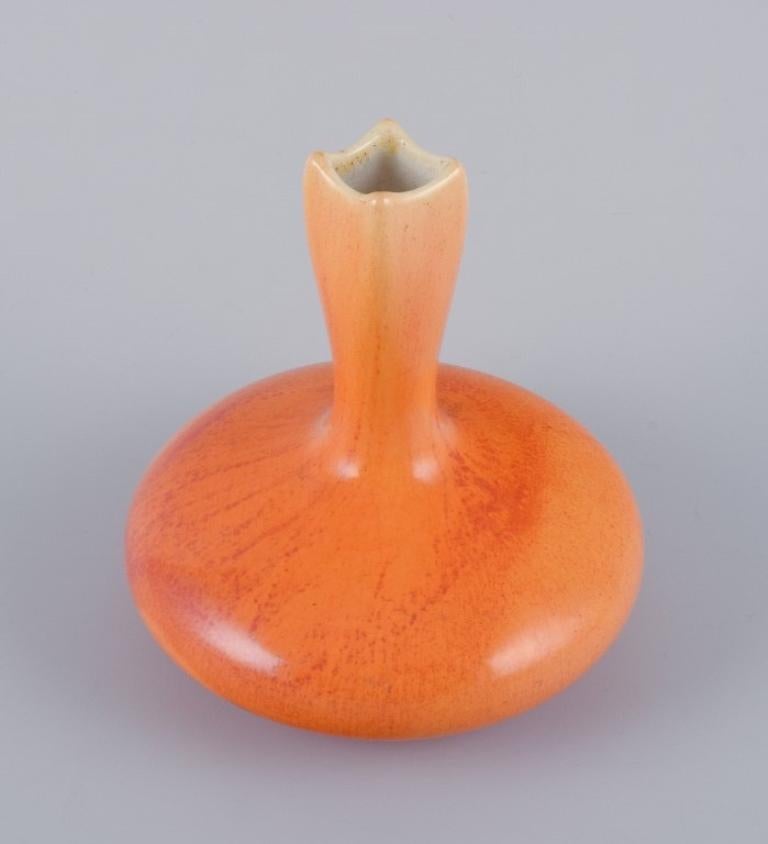 Swedish Rörstrand, Sweden, faience vase with uranium yellow glaze. Early 20th century. For Sale