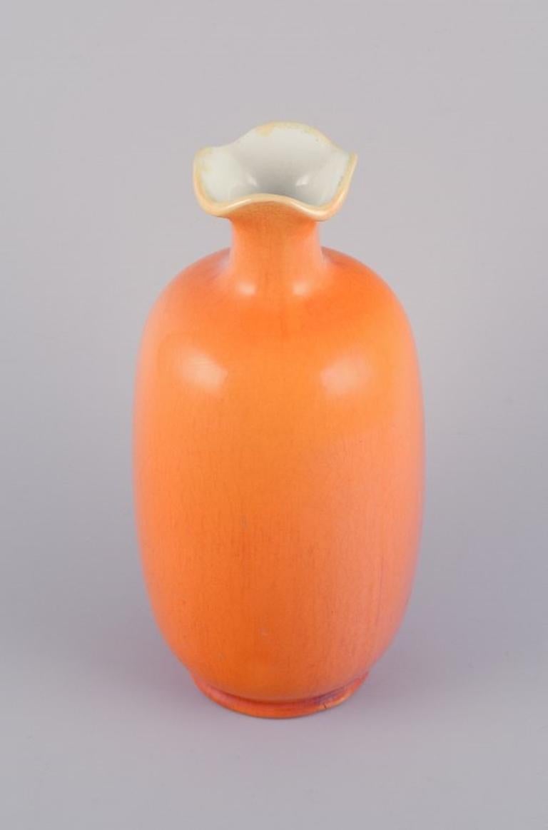Swedish Rörstrand, Sweden, large faience vase with uranium yellow glaze.  For Sale