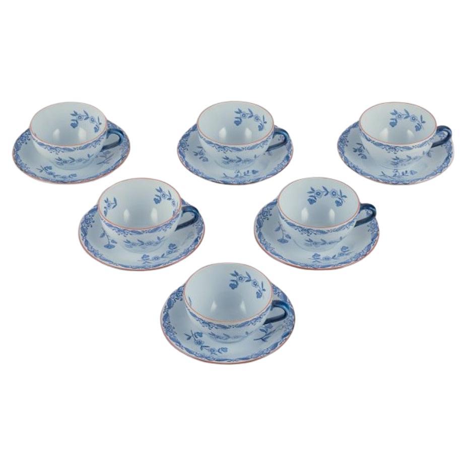Rörstrand, Sweden. Set of six "Ostindia" coffee cups and saucers in faience.  For Sale