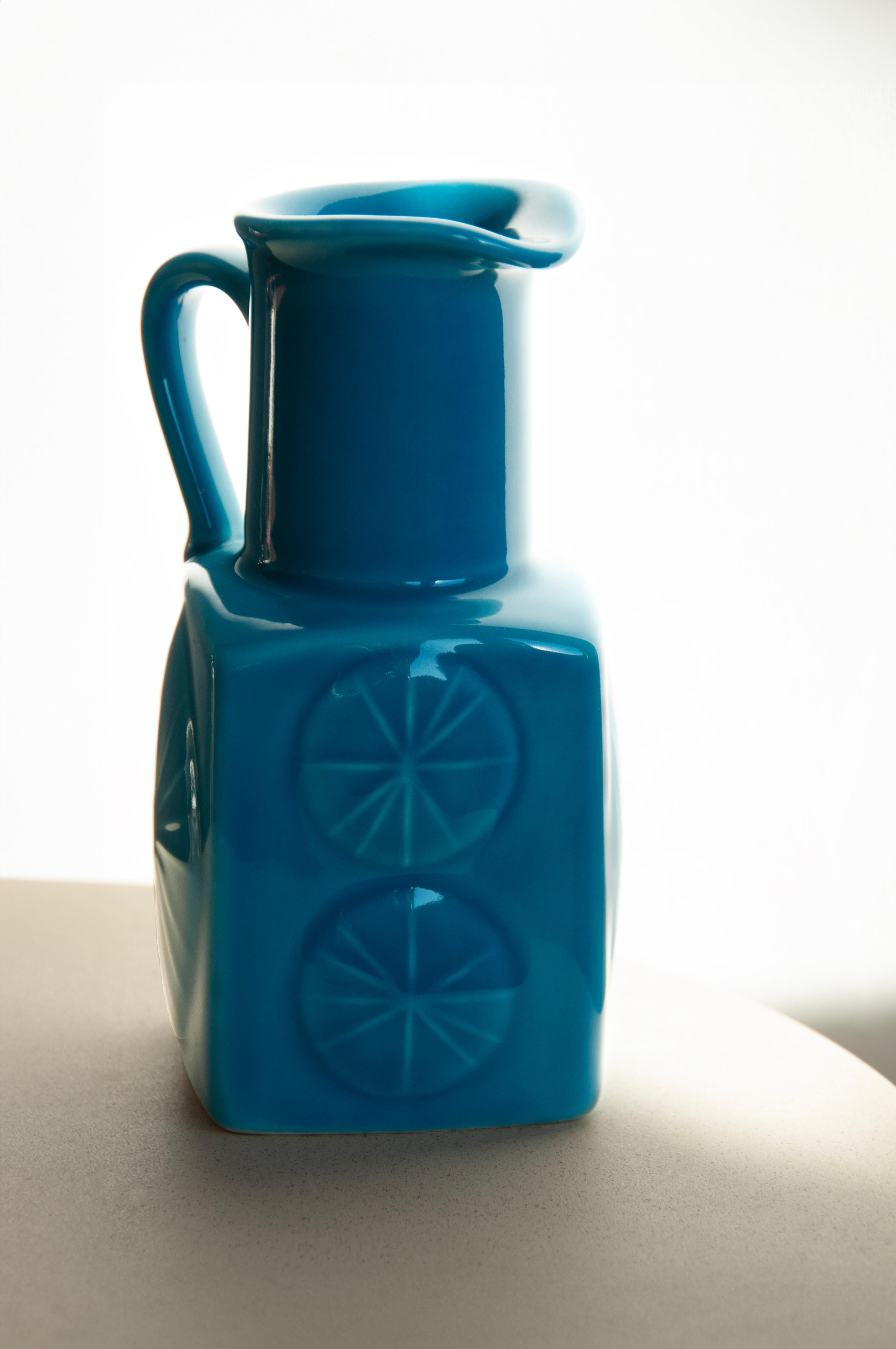 Rörstrand Vase: Carl Harry Stålhane Design, Turquoise Scandinavian Ceramic

Discover a rare gem from the 1960s: a fully glazed jug or vase crafted by the esteemed Swedish ceramist Carl Harry Stålhane. Originally designed for a Swedish route ship -