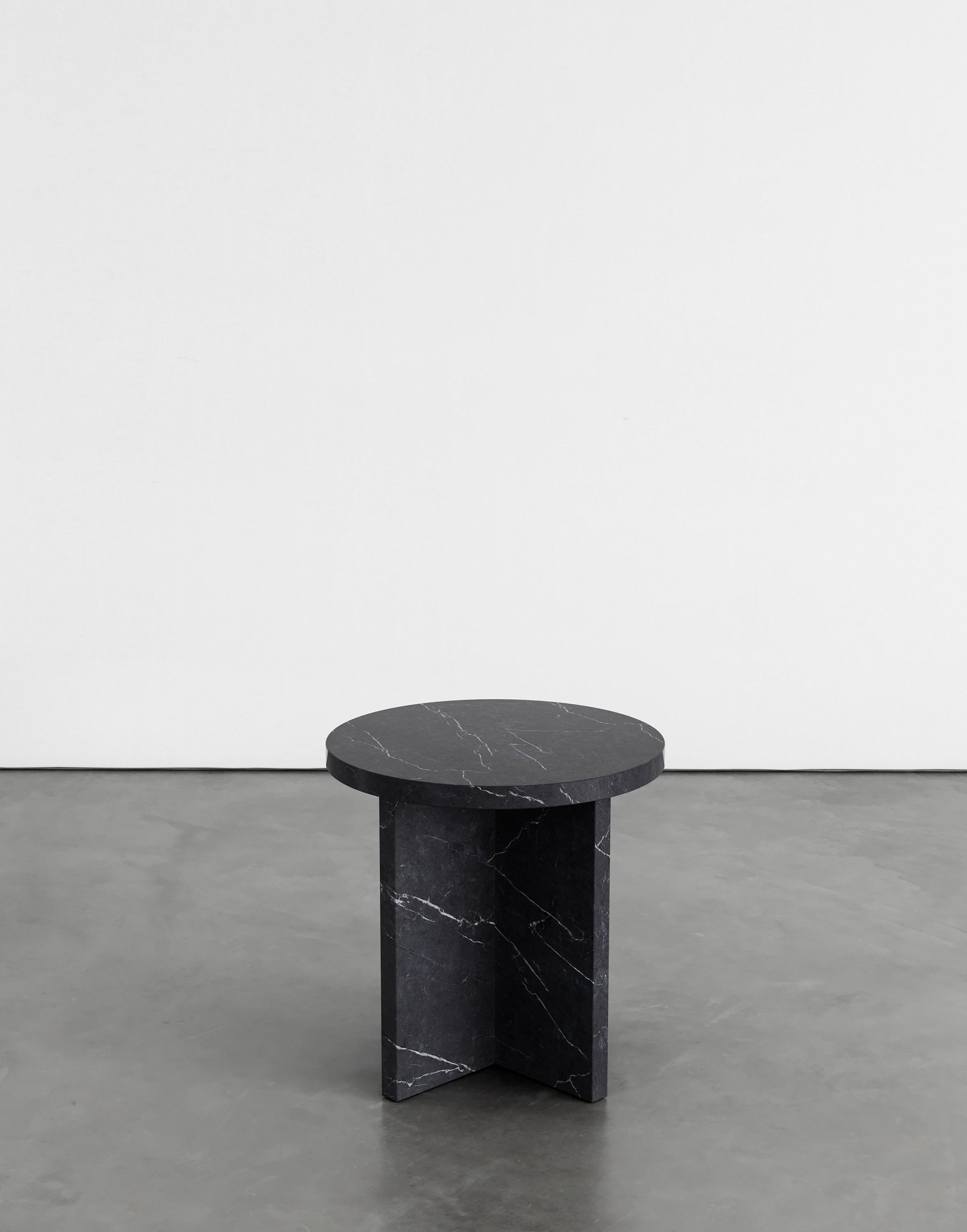 Rosa 45 side table by Agglomerati.
Dimensions: D 45 x H 45 cm.
Materials: Nero Marquina marble.
Available in other stones.

Rosa side table celebrates simplicity. It has striking geometric proportions that create a harmonious