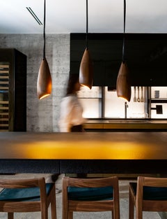 Rosa Contemporary carved Walnut hanging lamps by Nadine Hajjar