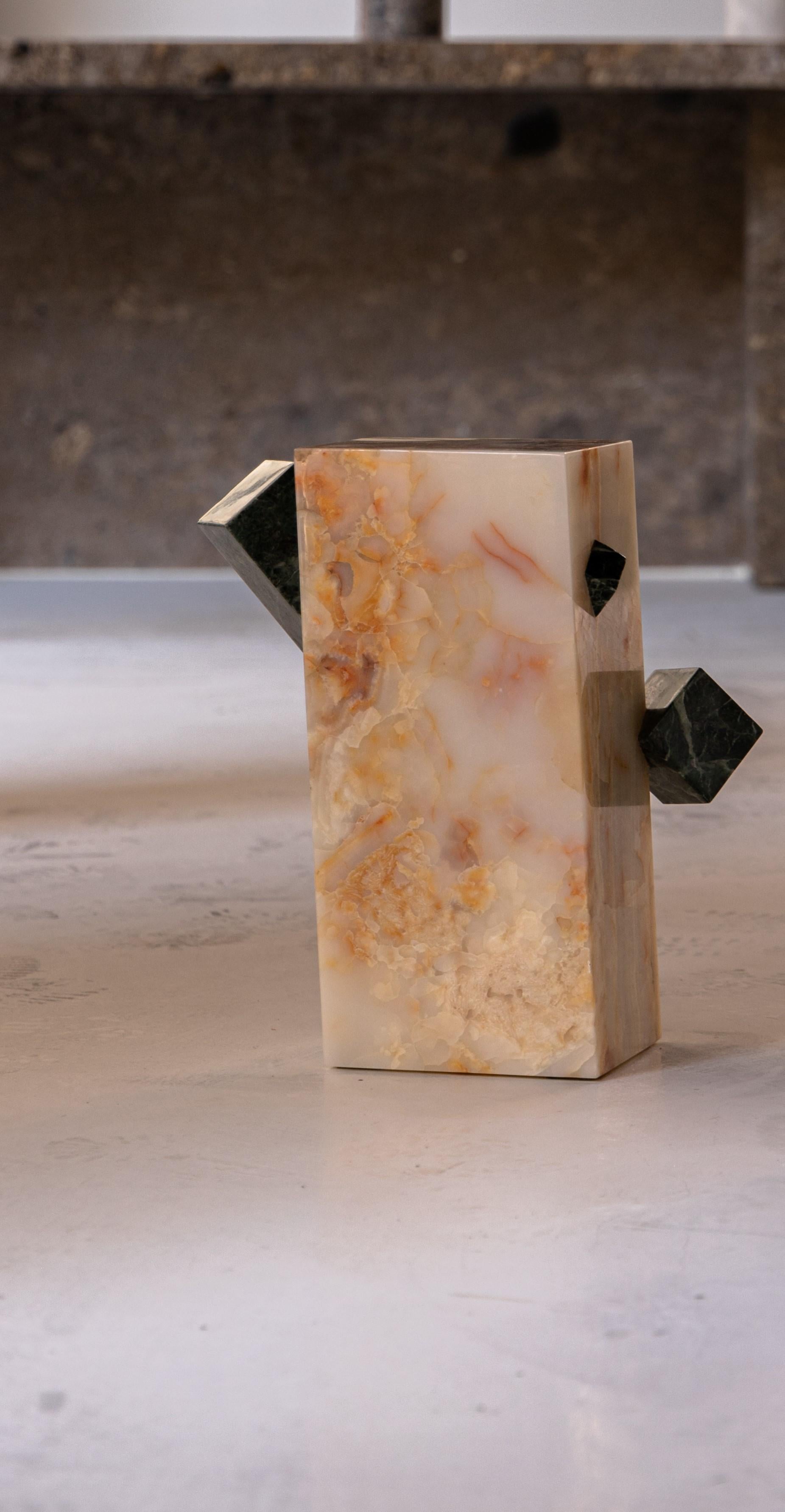 Our Crystal Side Tables are attention-grabbing examples of art blending with furniture design. The angular side tables exude an art gallery or public installation feel. They appear as if they are emerging into your home as part of a spontaneous