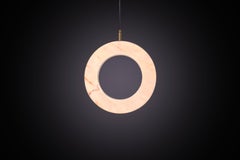 ‘Rosa Ring’ by Marc Wood. Brass and 'Rosa Estremoz' Marble handmade LED lamp.
