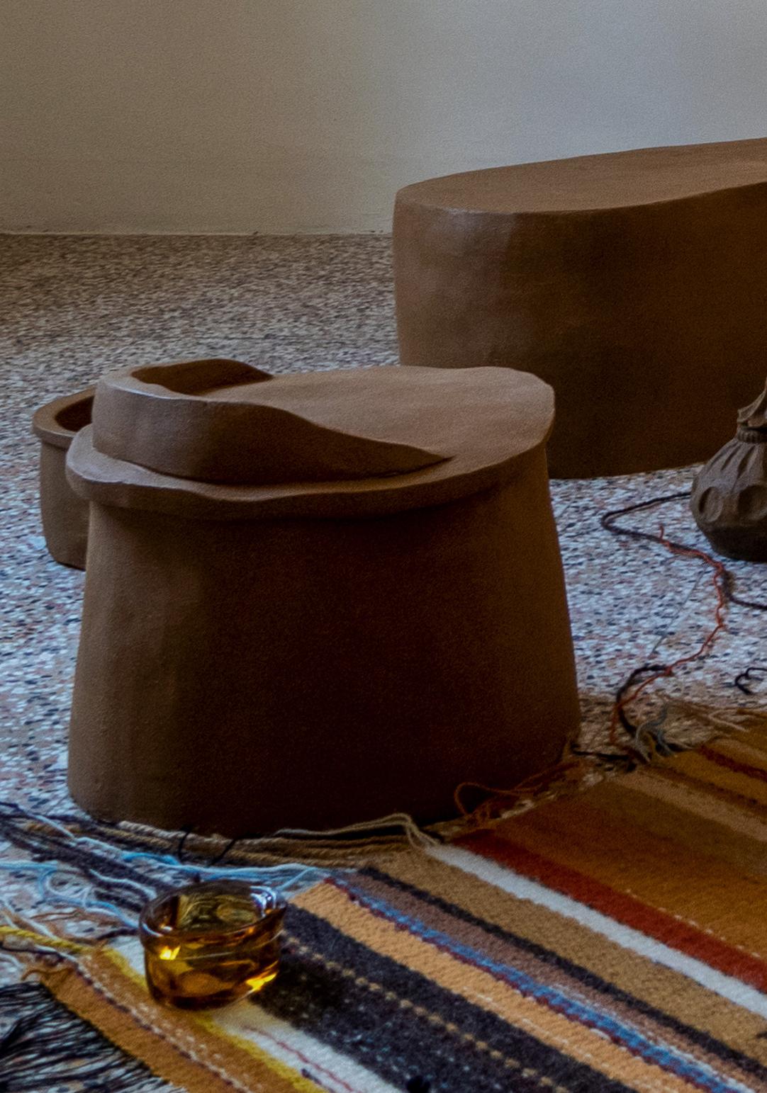 Integral part, III

Inspired by the Mediterranean, by the Maghreb Ksar, with seats made entirely of raw land, natural oils, and waxes. They are a metaphor and abstraction of the typical Moroccan collective dwellings, in which spaces - or even