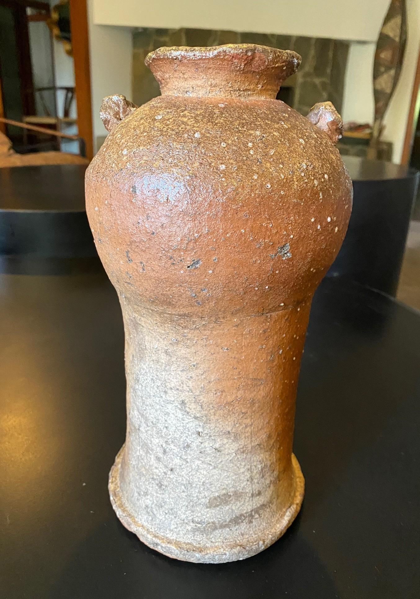 An absolutely gorgeous hand-crafted Bizen Yaki Ware pottery vase by Japanese master potter Kitaoji Rosanjin (1883-1959) who was arguably one of if not the greatest artists/ceramicists of the 20th century. Rosanjin (whose real name was Kitaoji
