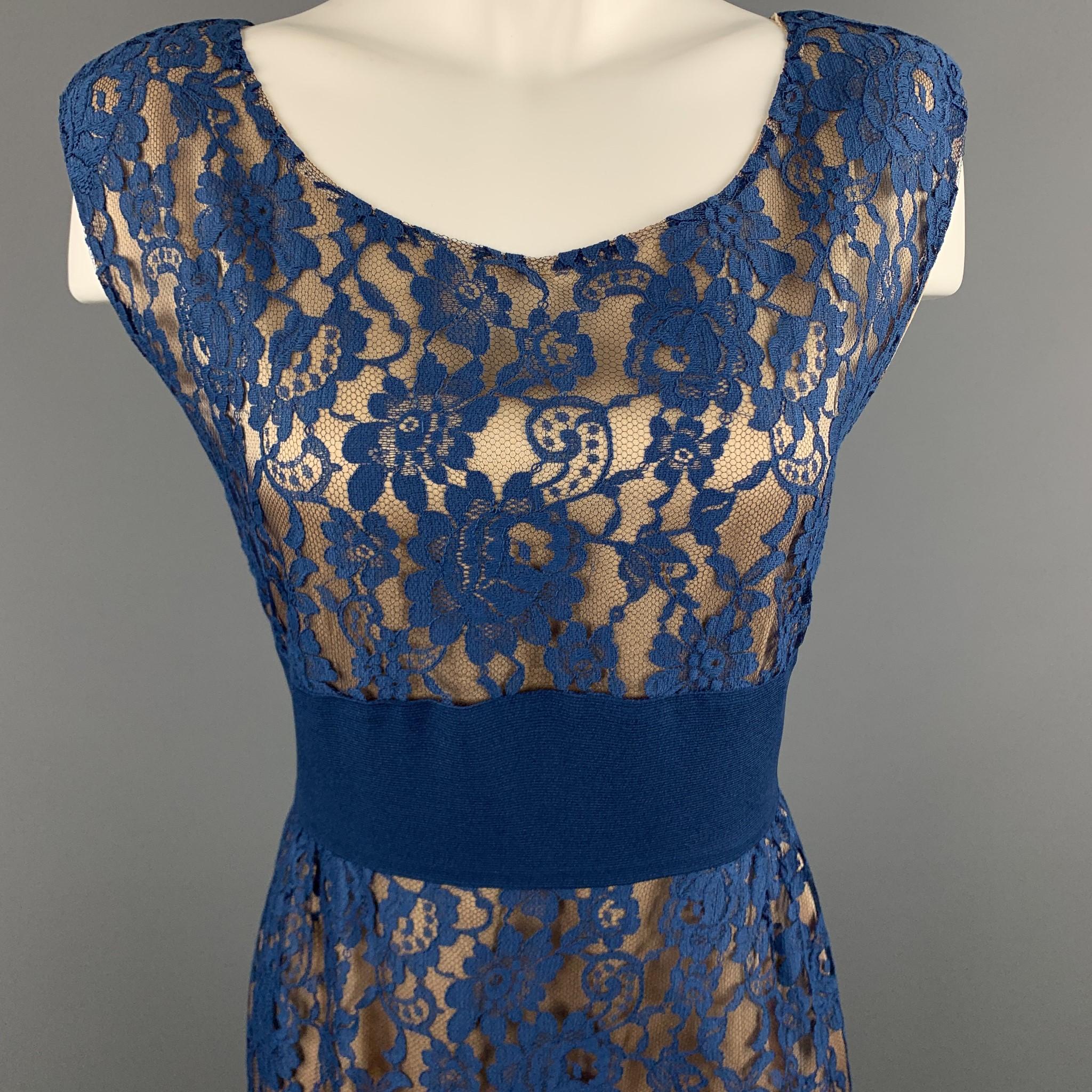 Vintage ROSANNA MANZONI per L'ETICHETTA sleeveless shift dress comes in blue silk lace with a round boat neckline, thick waistband, and beige satin liner. Made in France.

Excellent Pre-Owned Condition.
Marked: FR 42

Measurements:

Shoulder: 17