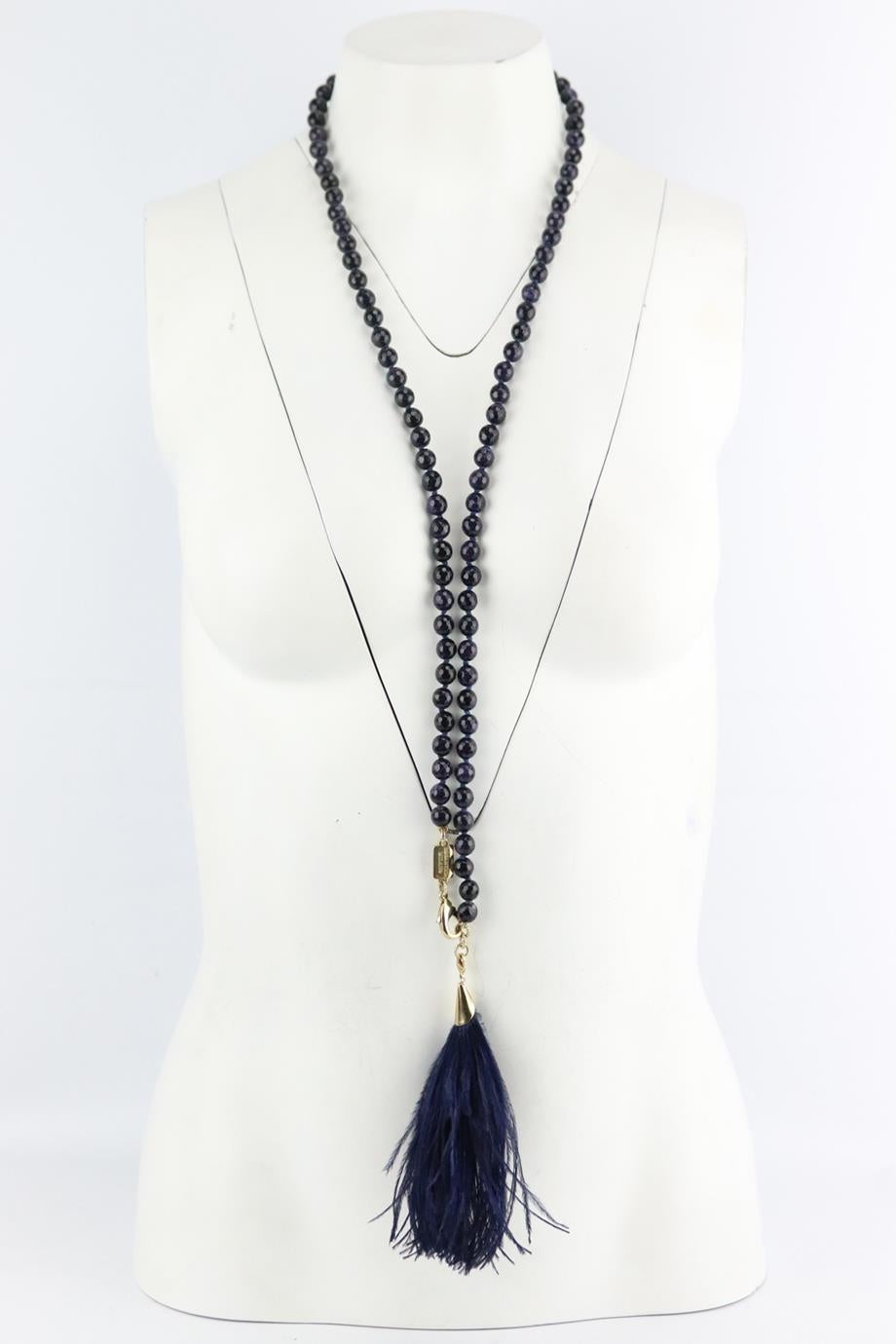 Rosantica feather tasseled bead necklace. Made from metallic navy beads and finished with a tasseled feather design. Navy. Lobster clasp fastening at back. Does not come with dustbag or box. Drop: 20in. Very good condition - No sign of wear; see