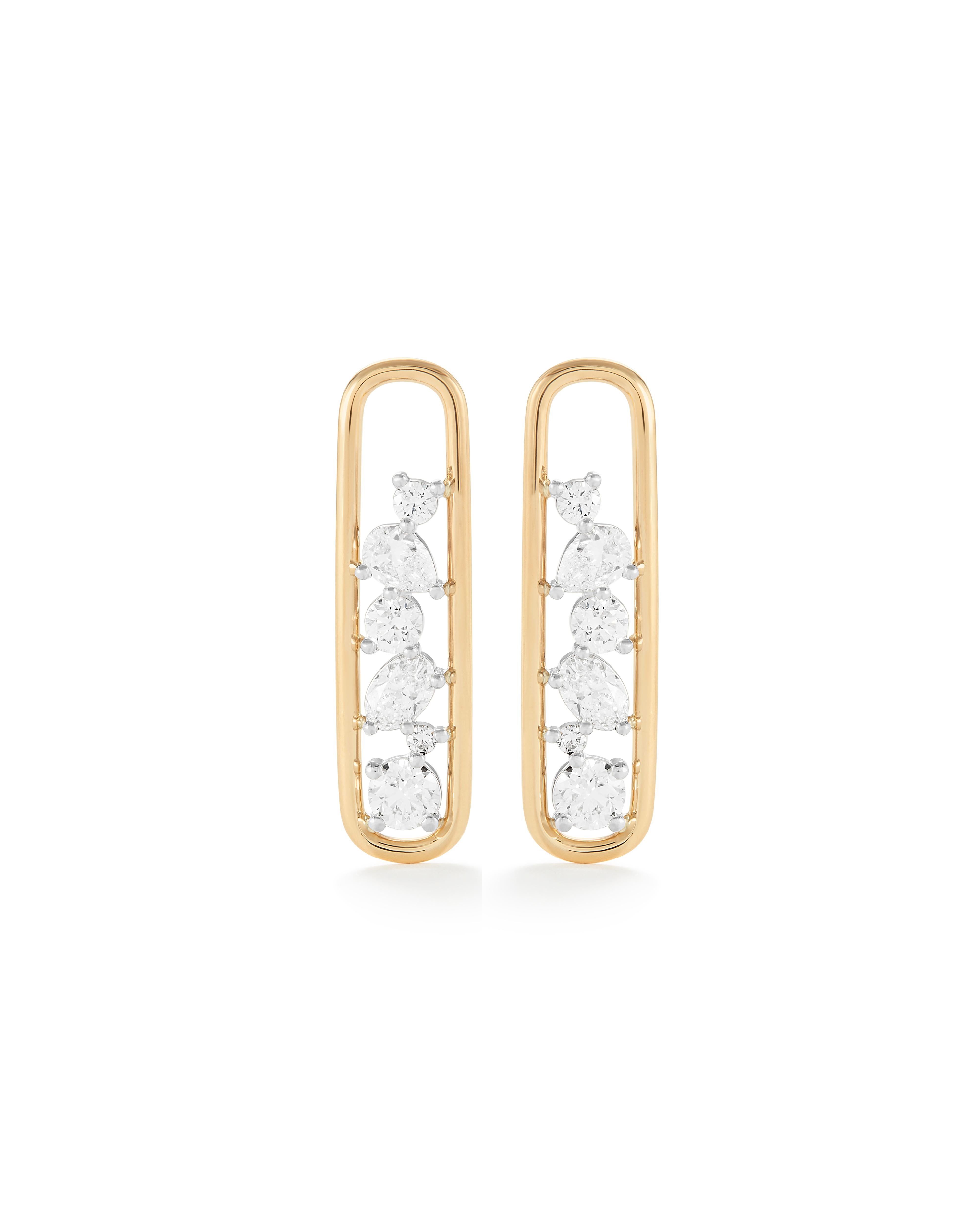 Dreamy drop earrings that will elevate any outfit! They are meticulously handcrafted in 18K solid gold with varying sized round, pear and oval shaped natural diamonds set in platinum. 

The Mara Collection was built around the beauty of negative