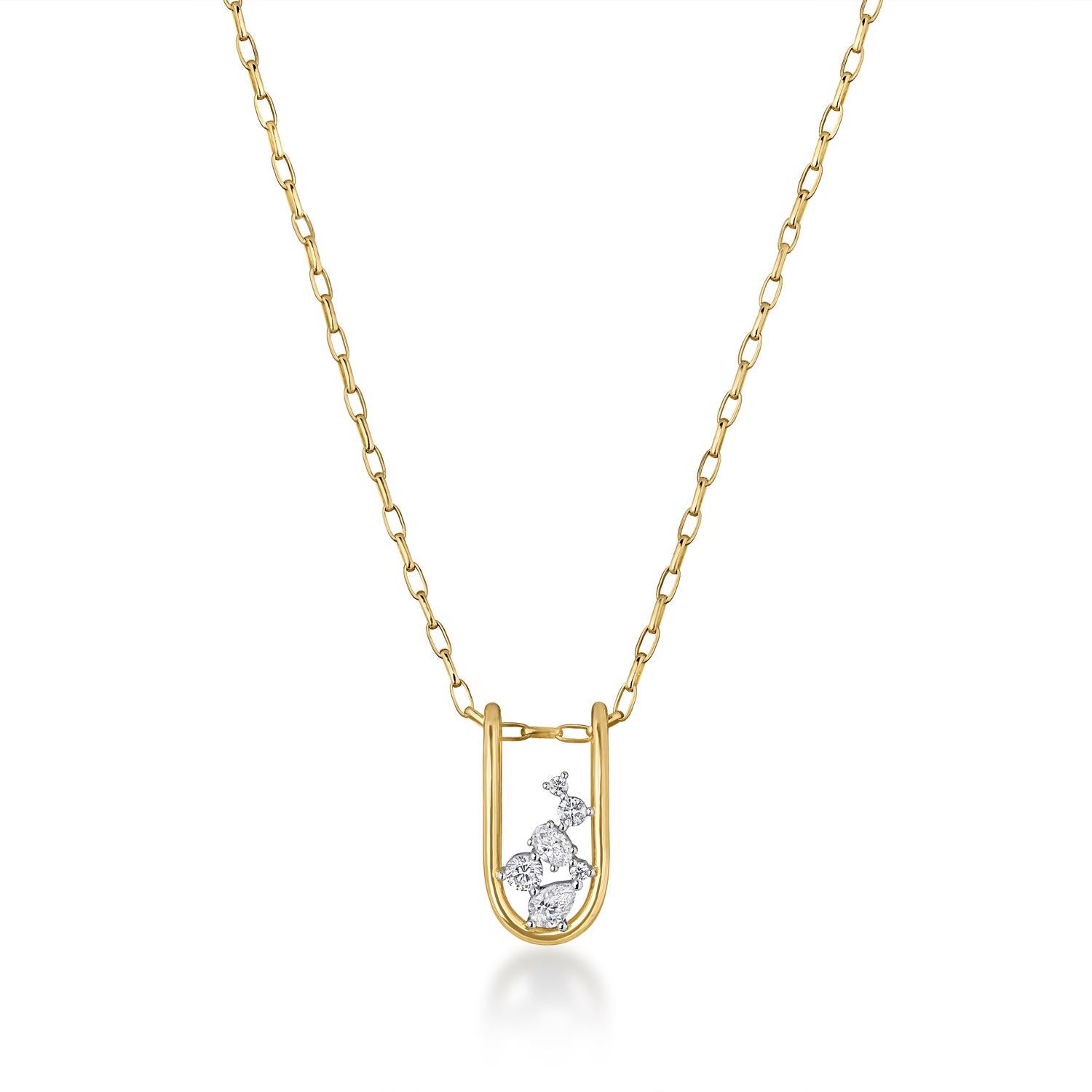 A 27mm small folded link pendant perfect to wear alone or layered. It is meticulously handcrafted with 18K solid gold with varying round, oval, and pear natural diamonds set in platinum. 

The Mara Collection was built around the beauty of negative