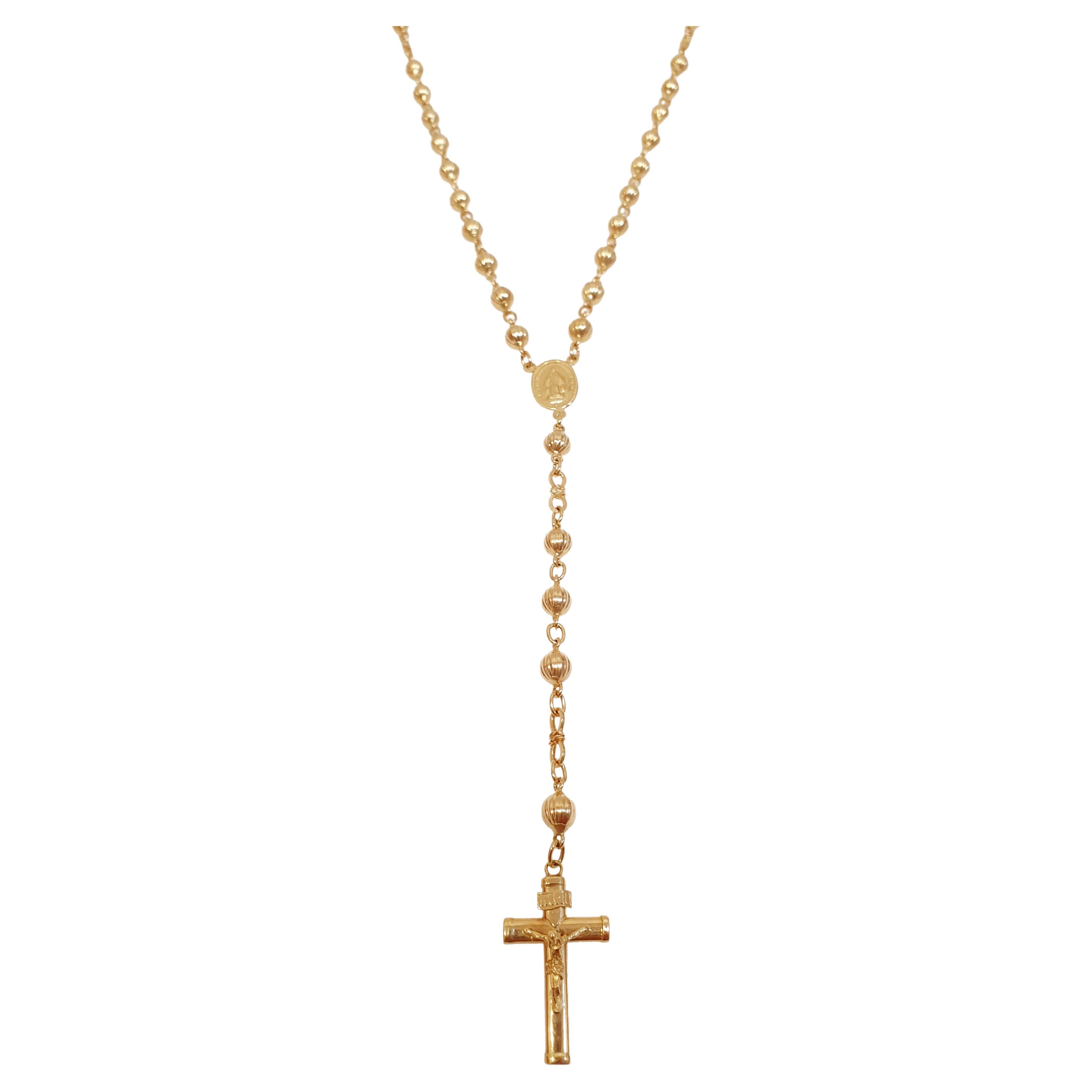 Rosary Necklace in 18K Gold and Onyx
 Rosary Necklace Unisex Woman Man with Virgin Mary Miraculous Medal and Cross
18kt rose gold with Onyx with brilliant and satin finish
Weight: grams 11
Length to virgin  52cm  
Length from the Virgin to the Cross