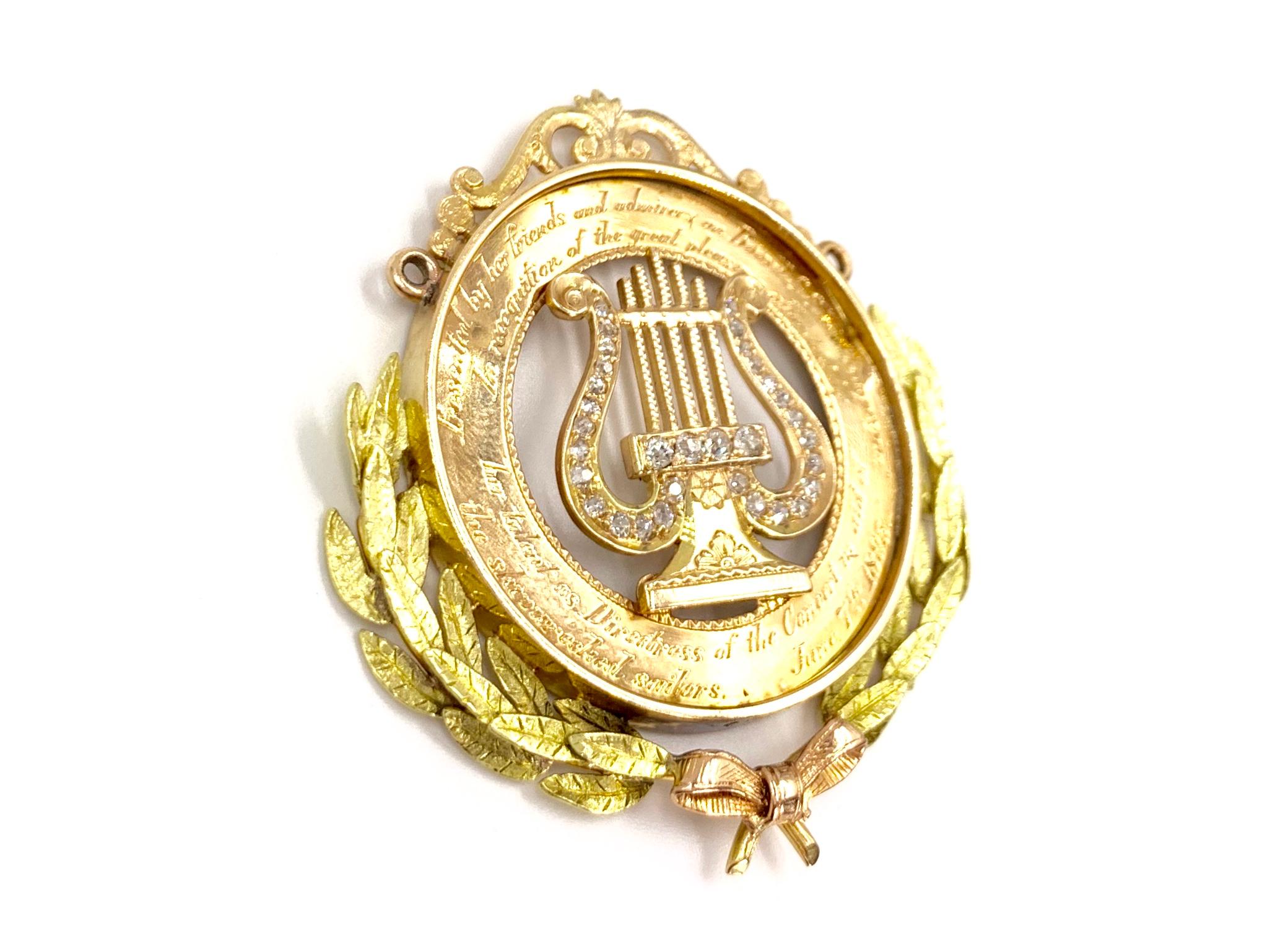 The perfect find for a music lover with great history. A beautiful and authentic antique 14 karat rose and yellow gold musical medallion pendant featuring 32 single cut diamonds. Diamonds are approximately H-I color, SI2 clarity. Medallion pendant