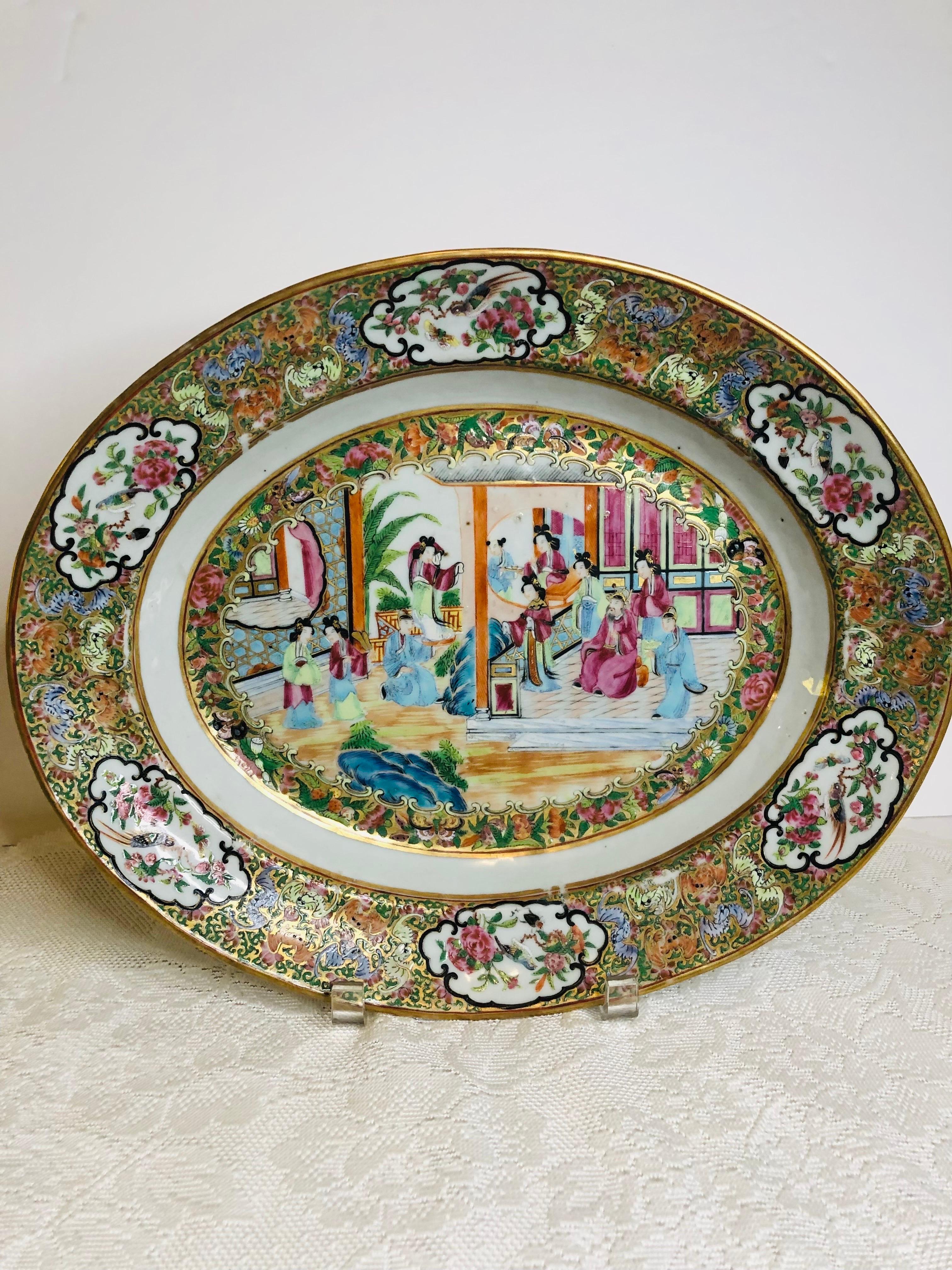 I want to present to you this fabulous Rose Canton Chinese Export platter, which has the most outstanding painting as well as profuse gold and colorful enamel decoration. This is truly a very fine quality rose canton platter from the 19th century.