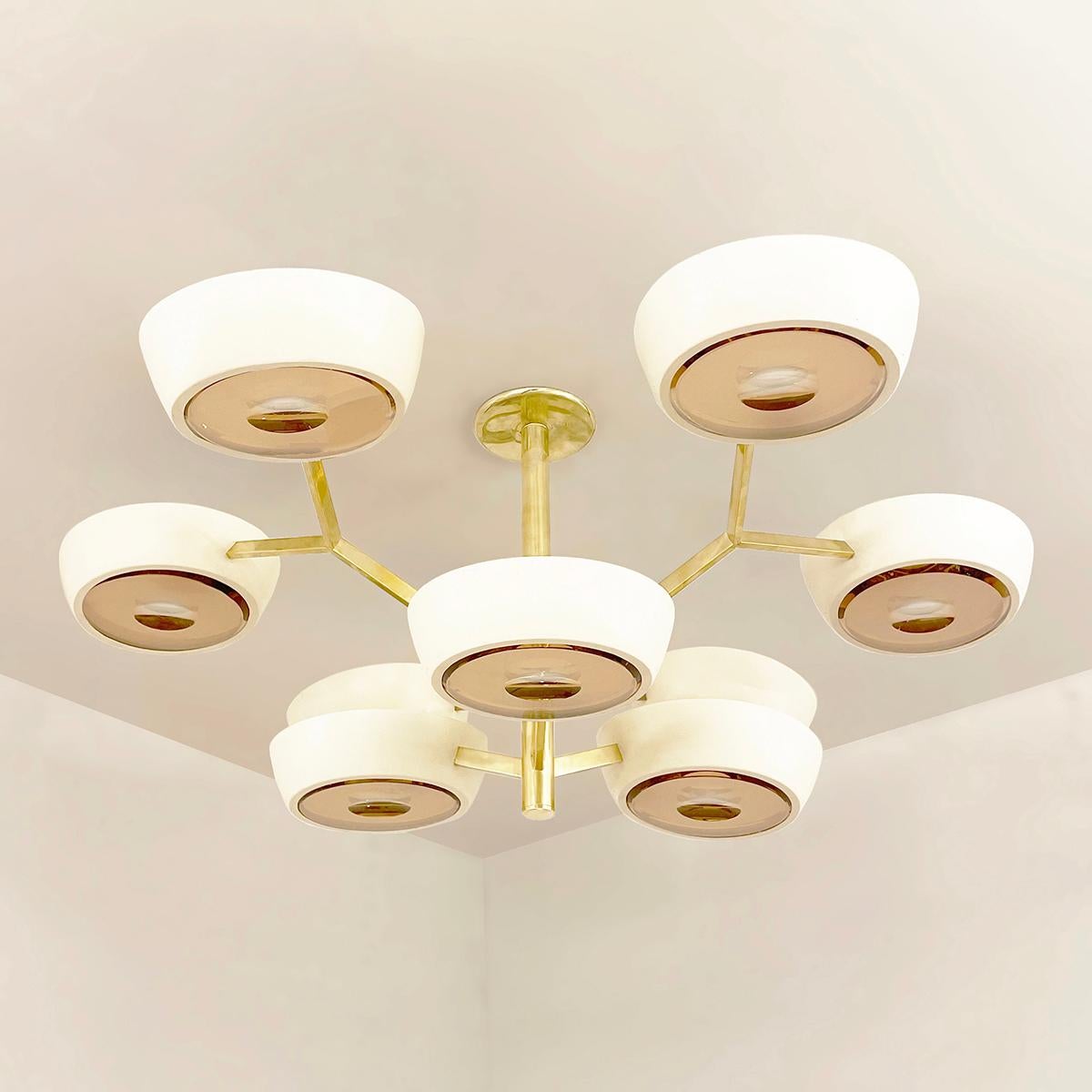 The Rose ceiling light is distinguished by its branching two-tiered frame ending with clean and modern shades. With the option to customize the color of the shades, the finish of the metal and the type of glass, the Rose is one of our most adaptable