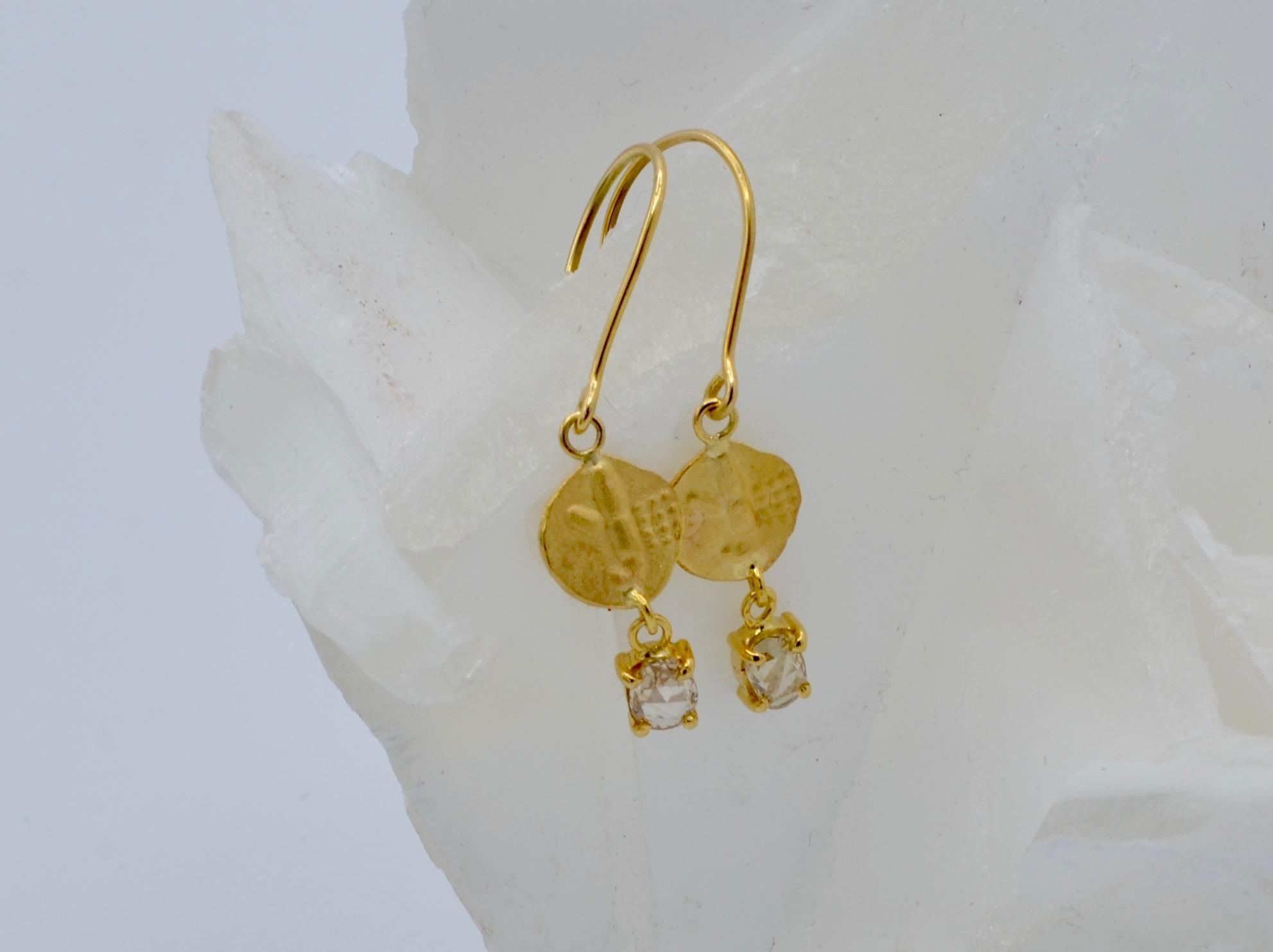 These earrings are delicate and shimmer with replica ancient 'coins' and diamond rose cut champagne drops that dazzle. The diamonds ( aprox 0.50 ct tw)  are prong set with a bezel to compliment the round 'coin'. They are the perfect combination of