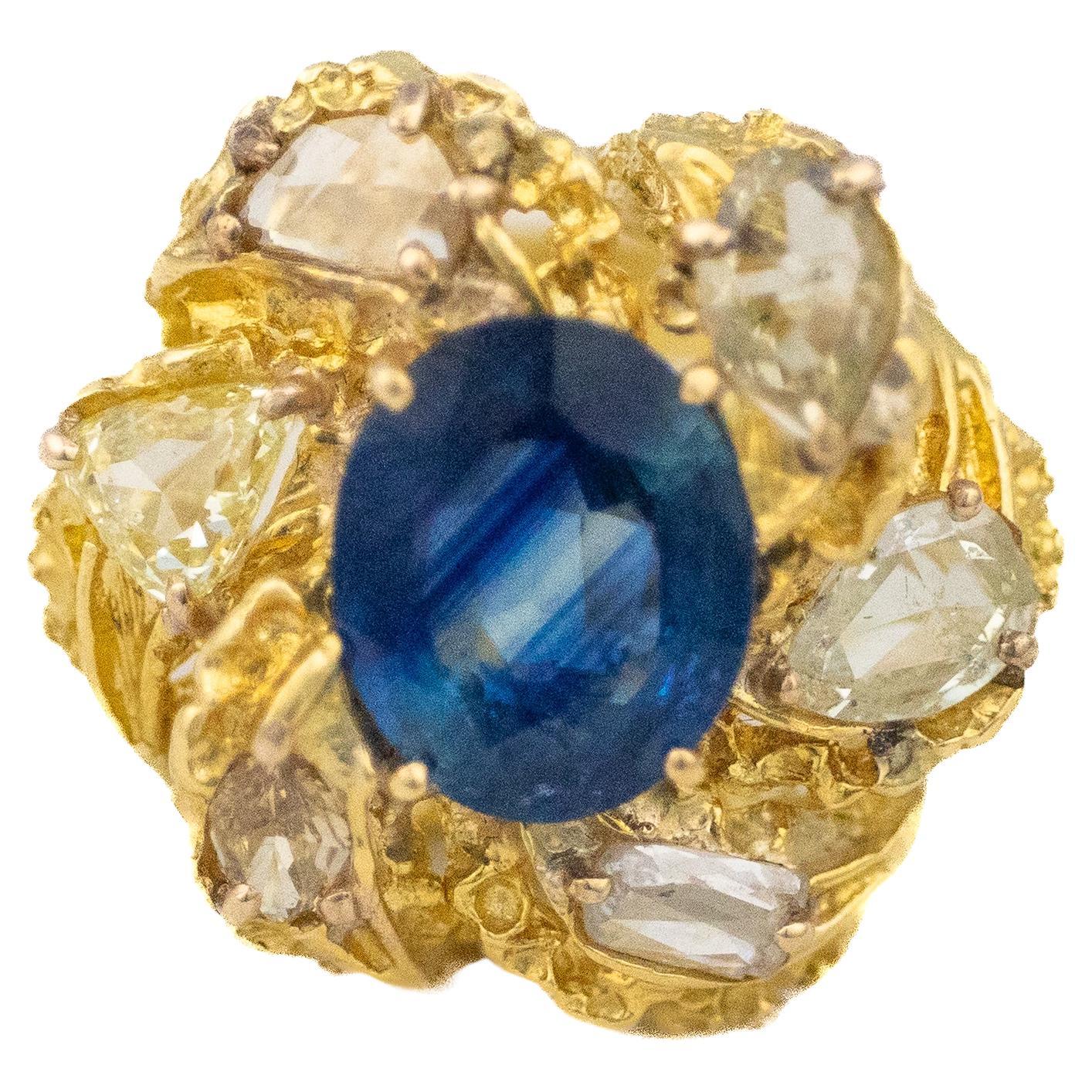 Bague fleur en diamant taillé en rose et saphir taillé en ovale