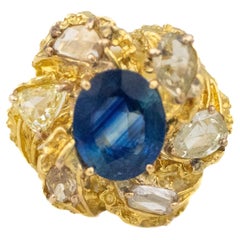 Bague fleur en diamant taillé en rose et saphir taillé en ovale