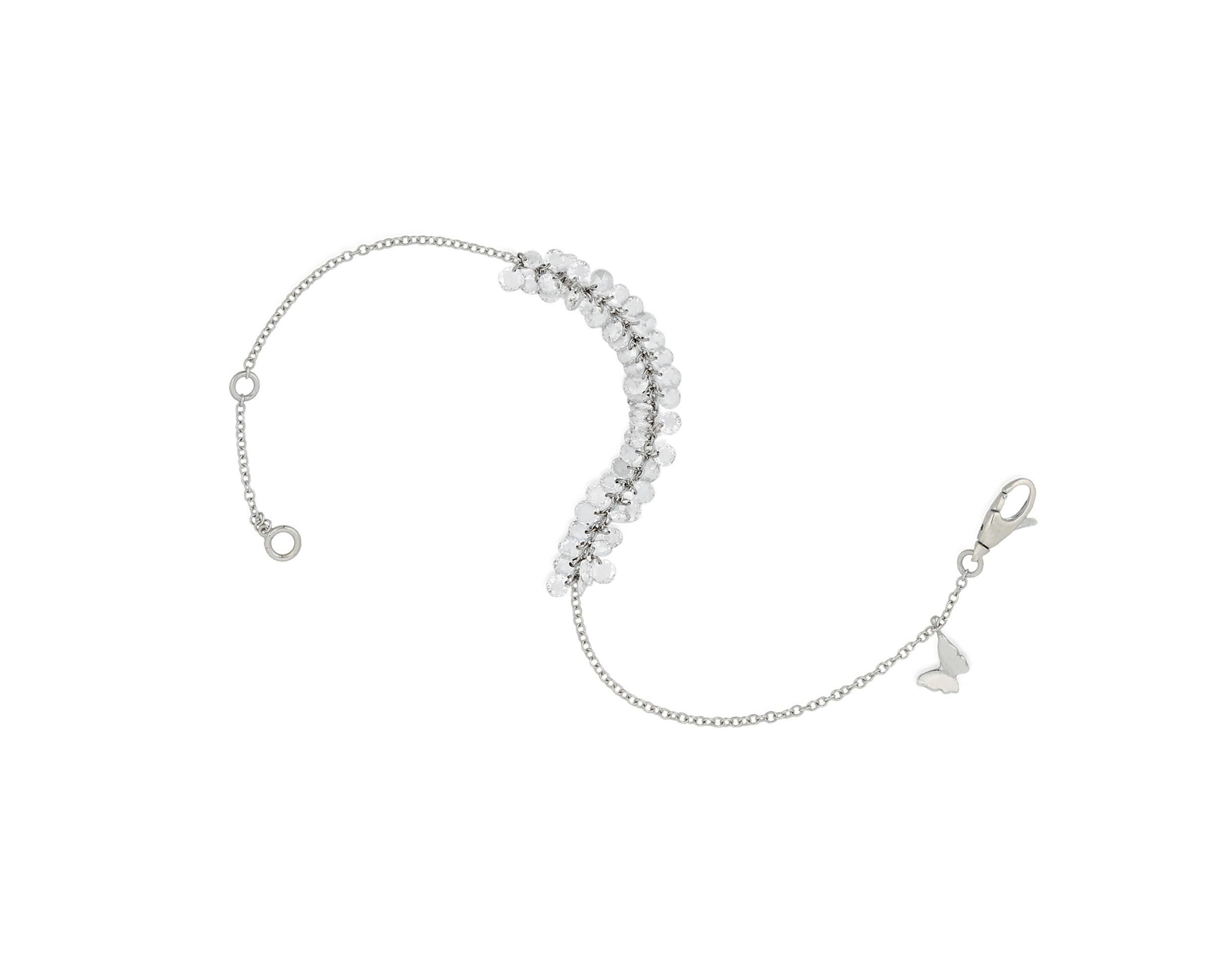 This delicate diamond bracelet showcases the romantic and elegant rose cut. The diamonds, totaling 2.07 carats, hang individually from their chain, ensuring the gemstones brilliantly catch the light with each movement. Set in 18K white gold.

7