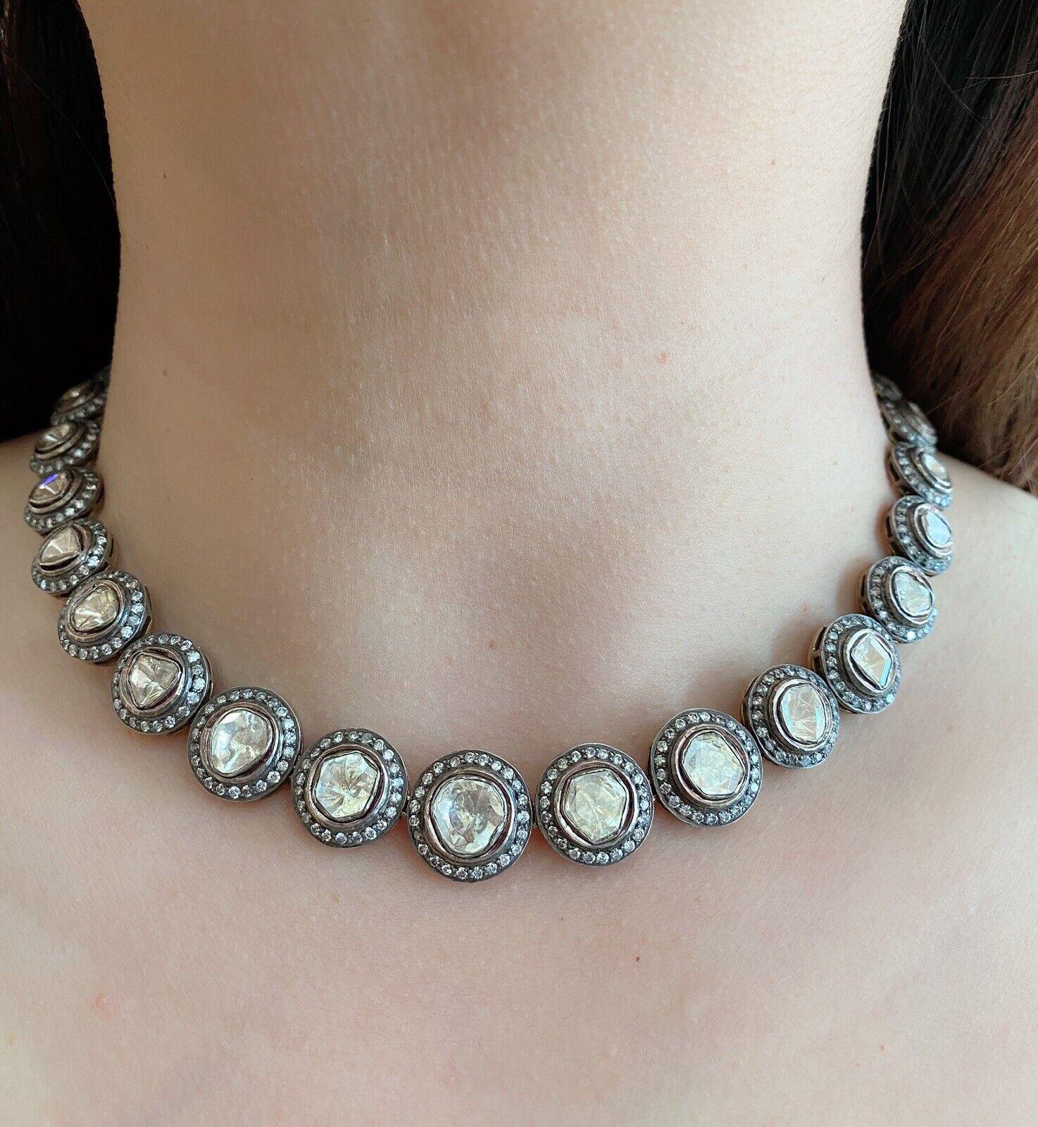 Rose Cut Diamond Choker Necklace 16 inches in 14k Yellow Gold and Silver

Rose cut Diamond Choker Necklace features graduating links of Flat Rose Cut Diamonds surrounded by bezels of Round Diamonds set in Silver and 14k Yellow Gold. The back side of