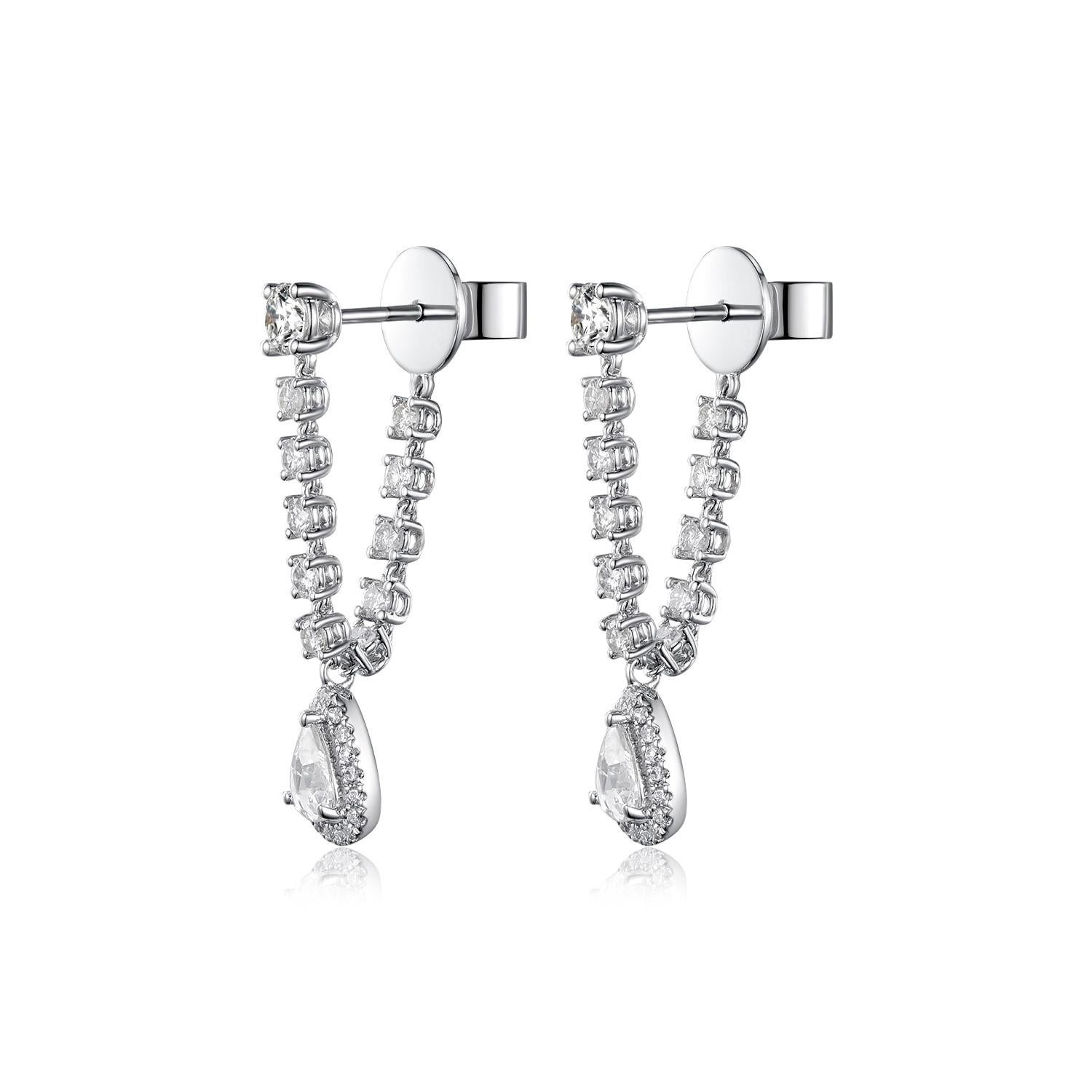 Introducing a pair of stunningly crafted drop earrings, a harmonious blend of classic elegance and modern sophistication. These earrings are fashioned from the finest 18K white gold, known for its high polish and enduring quality.

Each earring