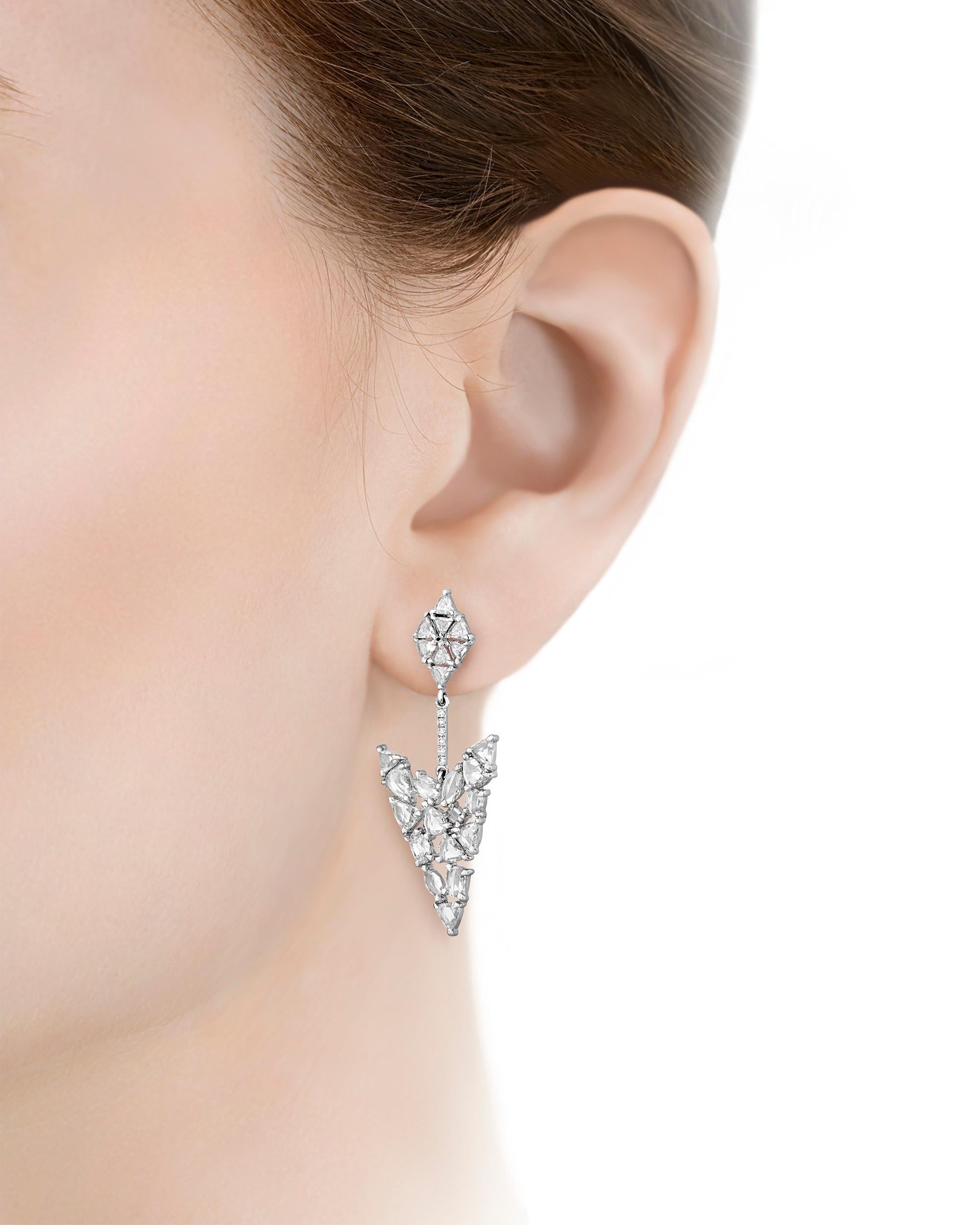 Dazzling rose-cut diamonds totaling 4.45 carats cover these dynamic arrow-shaped drop earrings. Set in 18K white gold and designed with meticulous attention to every detail, this elegant pair will glisten with every movement.

1 3/4