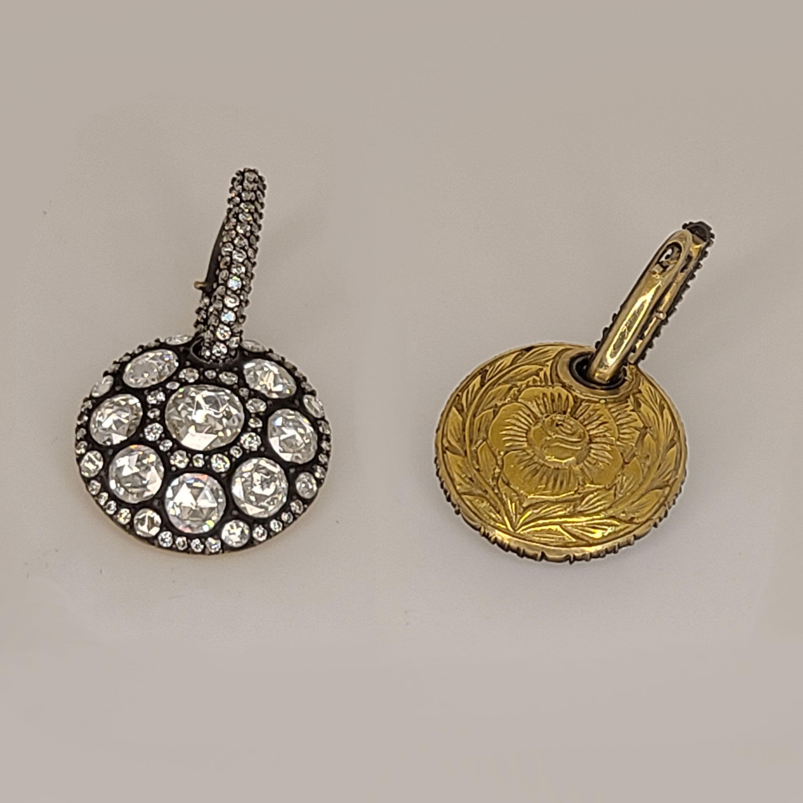 This 18K Gold earrings have 4.09cts of rose-cut Diamonds and 1.28cts of full-cut round brilliant Diamonds. These earrings are made of 18K Gold, however the rose-cut Diamonds are set on a sterling silver just like in its original times. Jewelry