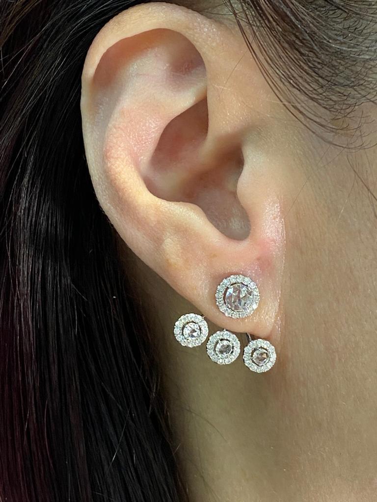 Introducing a stunning pair of earrings that will elevate your look to the next level - the Diamond studs. Crafted from 18 karat white gold, these earrings feature a detachable design that allows you to wear them on their own or with the 18K White