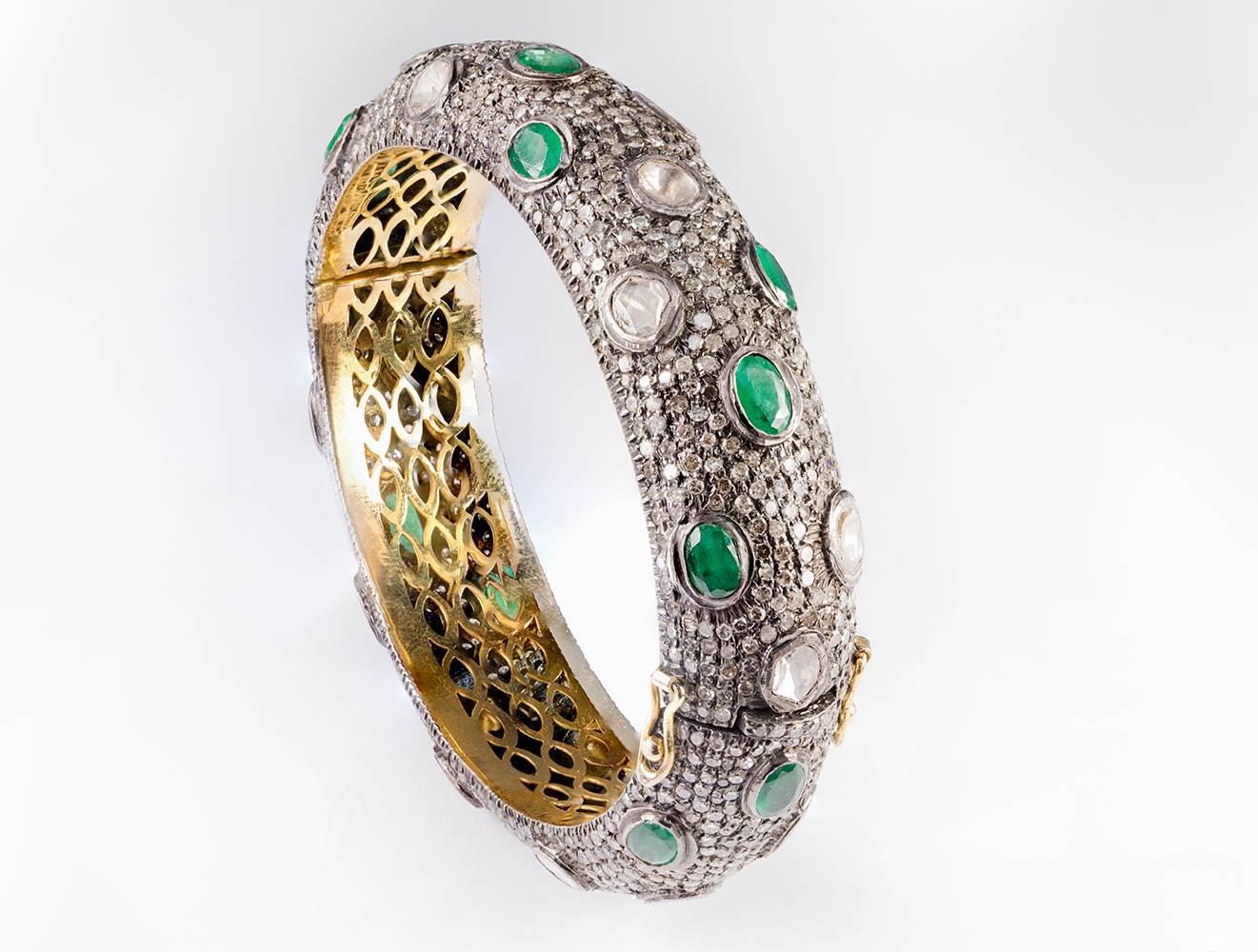 Rose Cut Brown and White Diamond of 8.80ct total weight and 11.00ct of Natural Emerald Oval Cut set on 925 Sterling Silver and 14kt gold Clamper Bracelet. 