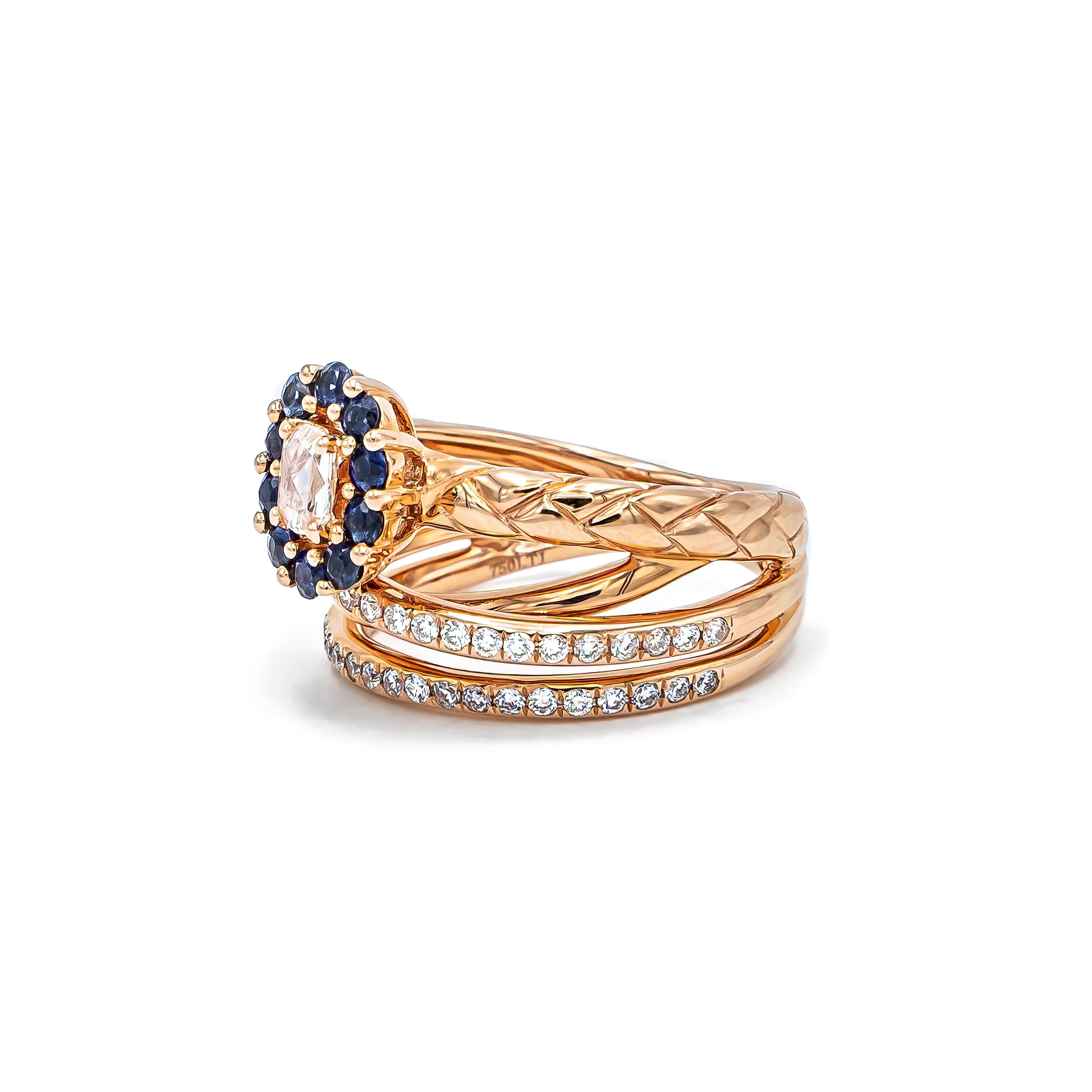 Total Ring Carat Weight: 0.99ct
Diamond Clarity: VS1
Diamond Color: G
Gold Purity: 18k
Gold Color: Rose
Gold Weight: 8.06g
Diamond & Gemstone Type: Natural Diamond & Gemstone, Conflict-Free

Rose Cut Diamond in Blue Sapphire Halo Set in 18k Gold &