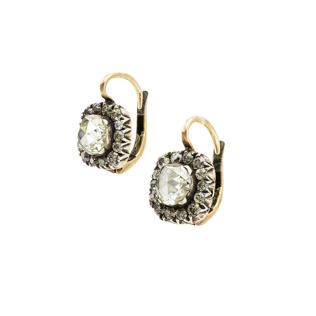 Rose-cut diamonds and old mine-cut diamonds silver gold vintage earrings.  Circa 1930s *

ABOUT THIS ITEM:  #E-DJ527H. Scroll down for detailed specifications.  These beautiful earrings feature a pair of large rose-cut diamonds bordered by smaller
