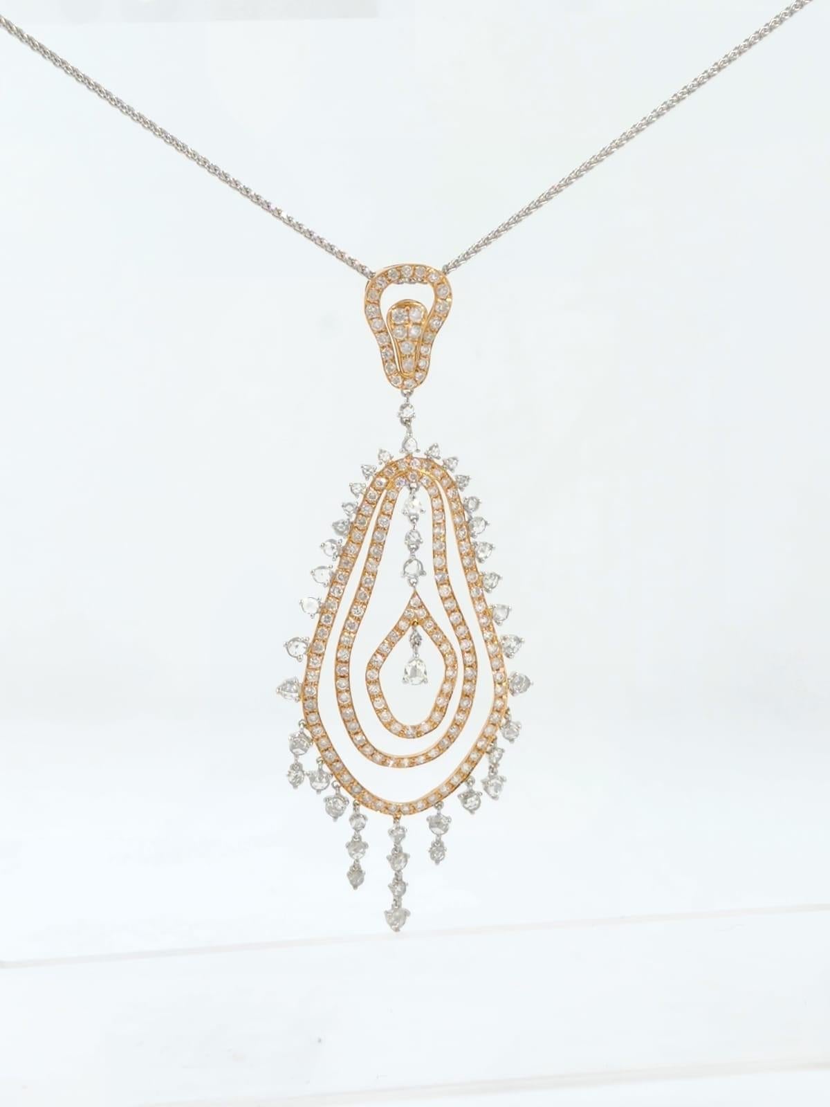 This necklace feature 1.40 carat of rose cut diamonds and 2.00 carat of white round diamonds. Necklace is set in 18 karat rose gold and white gold.  Great for everyday use and would make a wonderful gift ! 
Length of chain : 16 inch
Pendant diameter