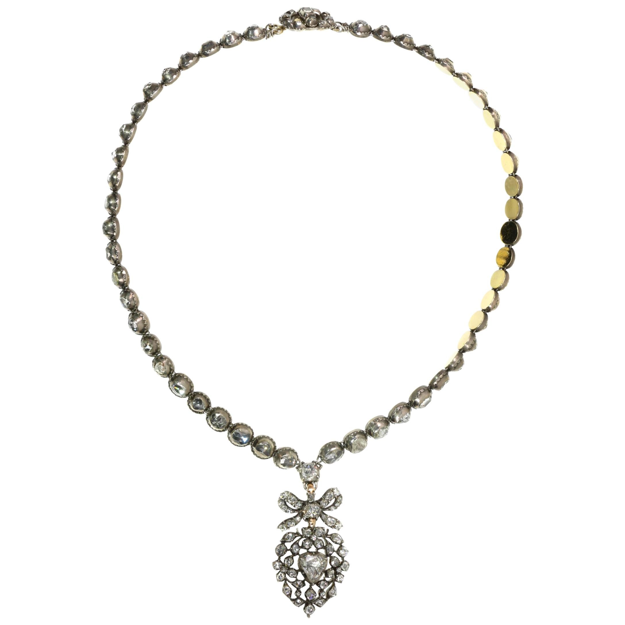 Rose Cut Diamond Riviere Necklace with a Diamond Set Crowned Heart Pendant