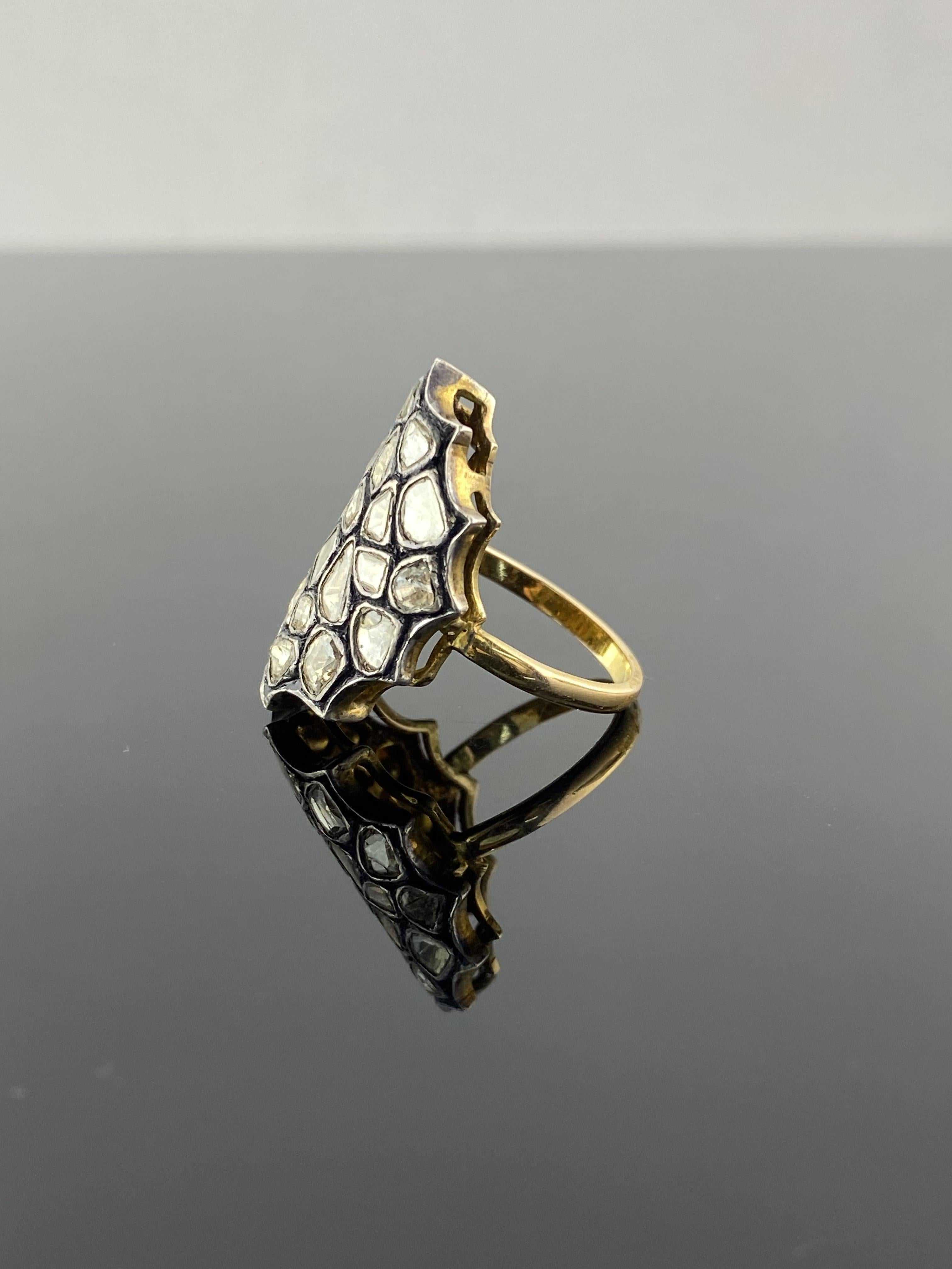 A beautiful, antique looking, 1.5 carat total rose-cut Diamond ring, set in silver and plated in yellow gold and black rhodium. The ring is currently sized at US 7, can be resized.
Feel free to message for more information!