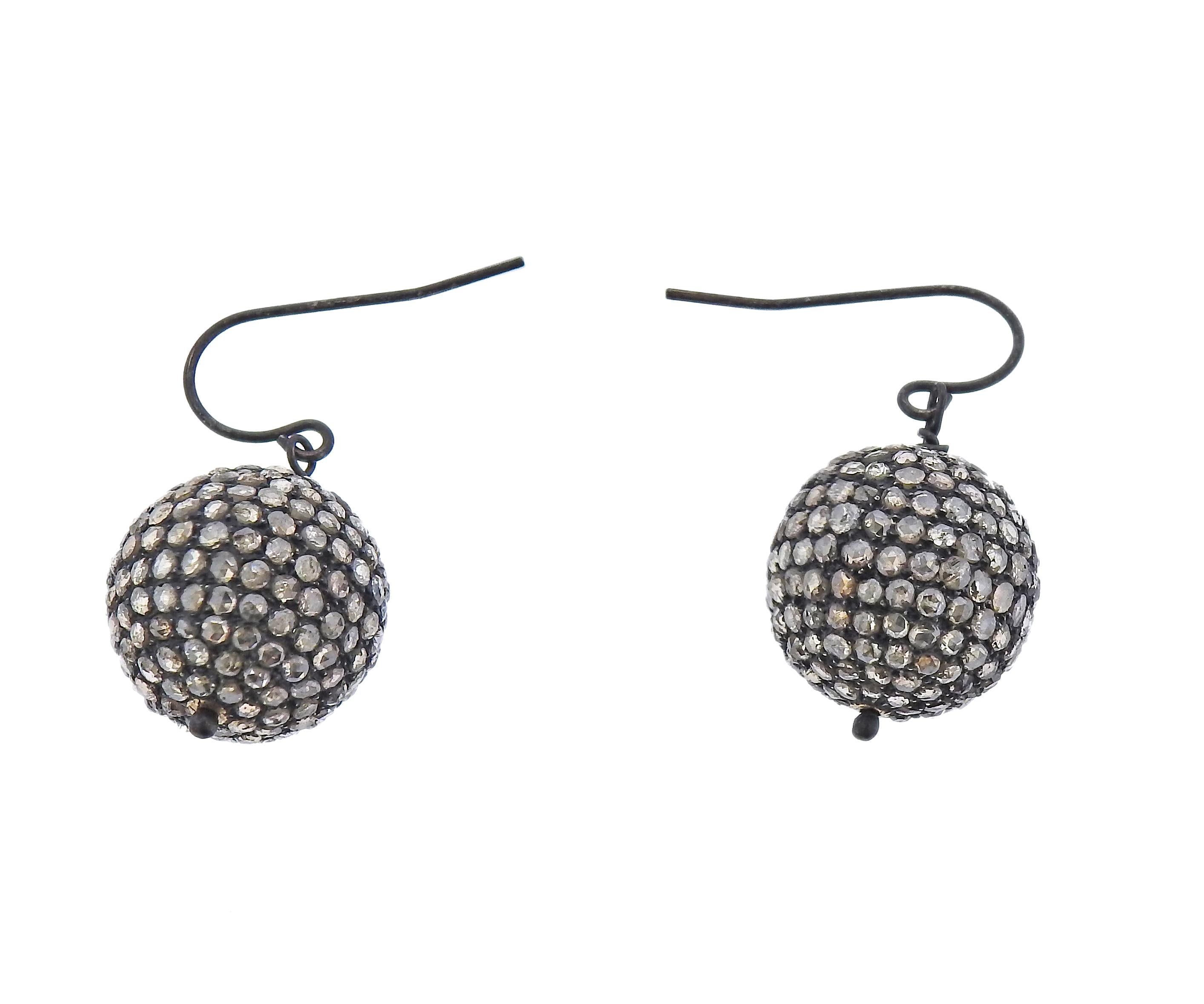 Pair of sterling silver ball drop earrings with rose cut diamonds. Earrings are 30mm long with wires, balls are 16mm in diameter. One diamond is missing. Weight - 10.3 grams. 