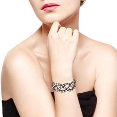 Filigrane Manschettenarmband aus 18 Karat Gelbgold und Silber mit Rosenschliff-Diamanten