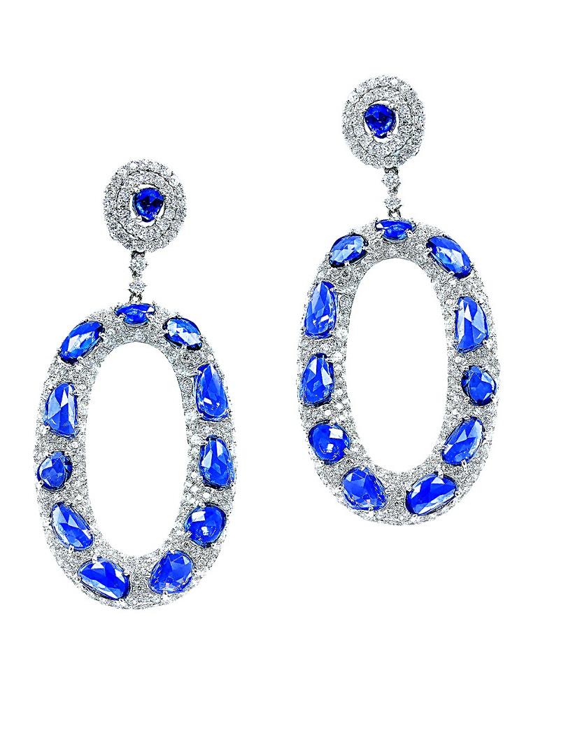 One-of-a-kind Rose Cut Sapphire and Diamond Earrings, unique combination of rose cut sapphires and diamonds in oval shape design. 
Features 17.00 Carats of Blue Sapphires, specially cut in rose cut surrounded by 11 carats of diamonds. 
2 1/2