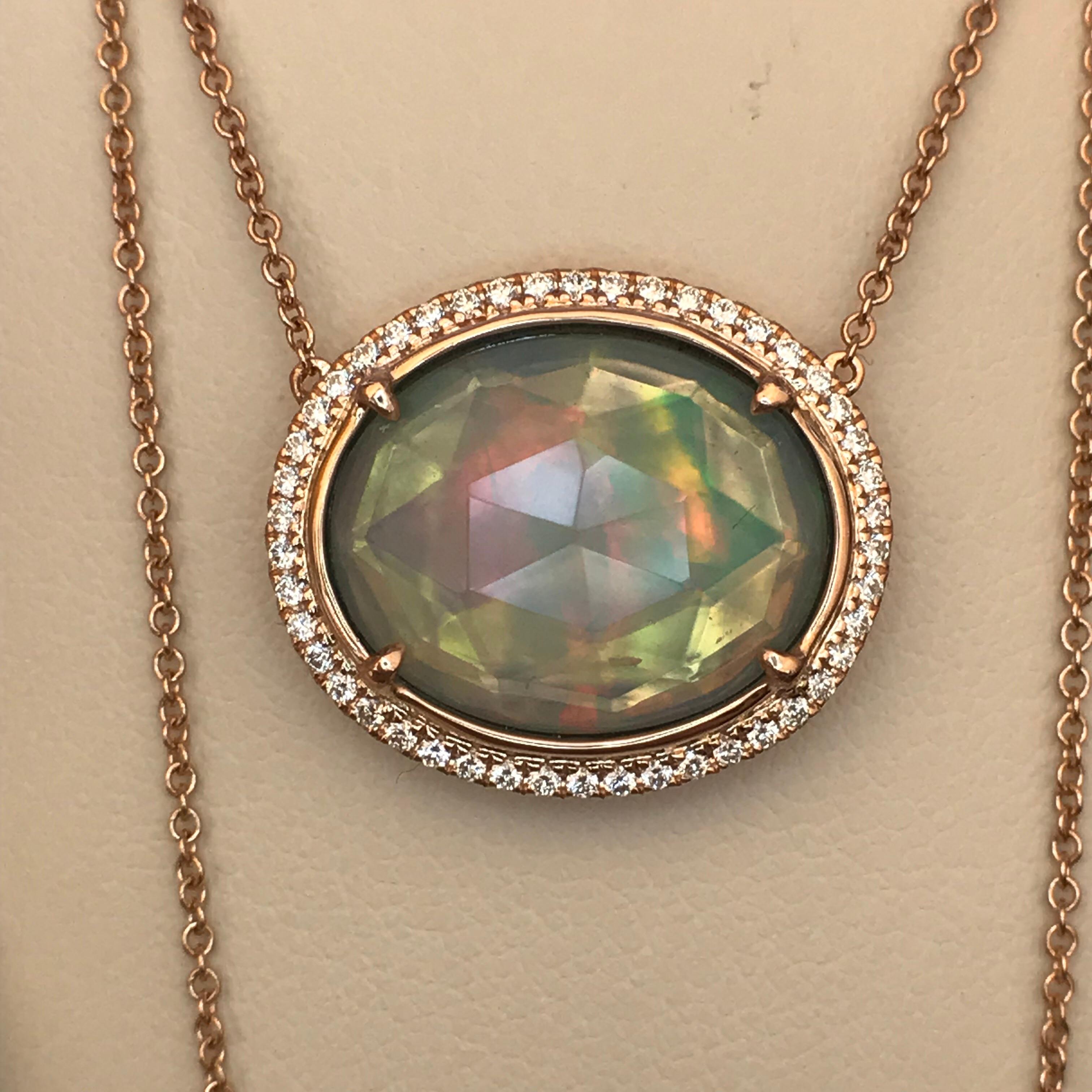 18kt Rose Gold
White Opal: 3.59ct
Diamonds: 0.32cttw (G color VS clarity)