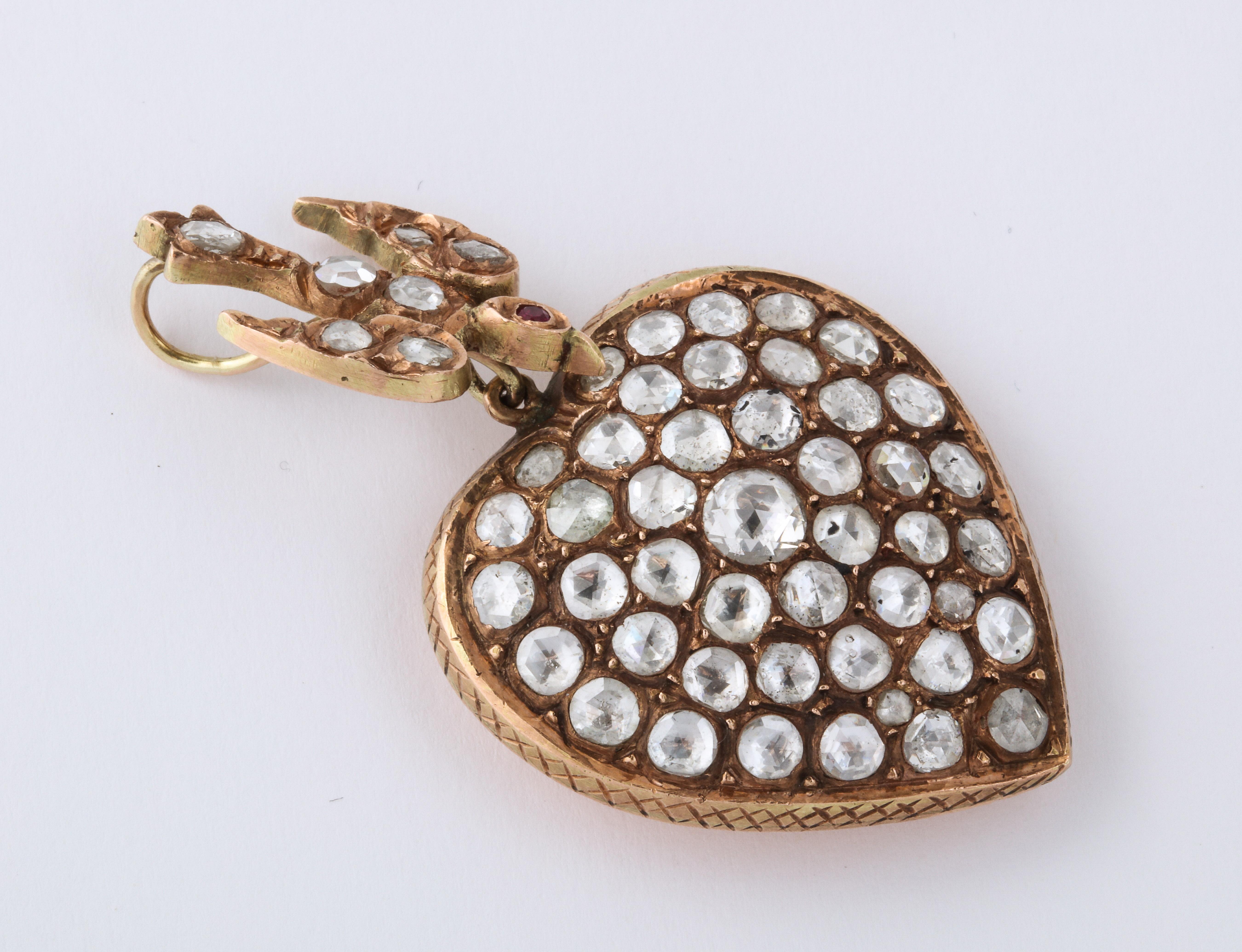 A great Rose Diamond Gold Heart with Bird Link. A wonderful re-make of a early 19th century piece with approx 3 cts of fine rose diamonds and a ruby. Beautifully executed. The heart can be worn on its own as can the bird.