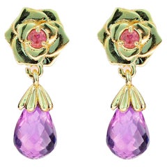 Boucles d'oreilles en or 14k avec fleur de rose. 