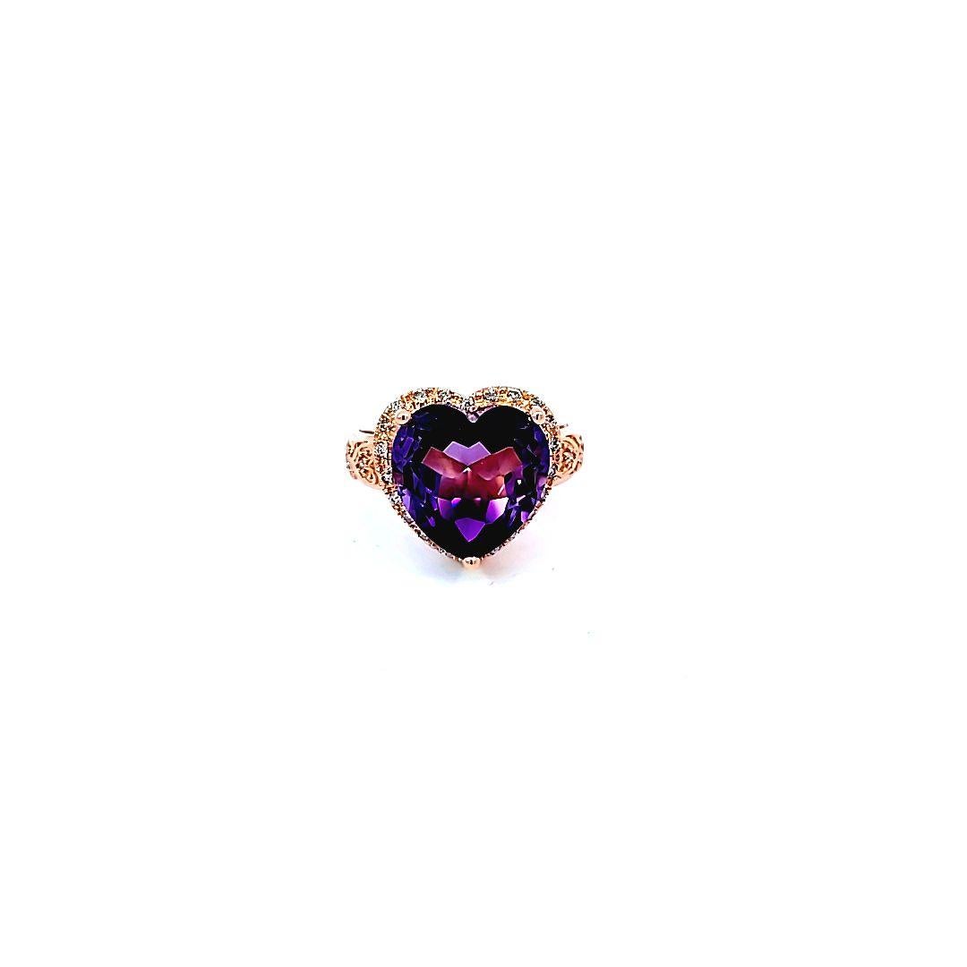 This beautiful heart-shaped amethyst is accented with a diamond trim, all in 14 karat rose gold.